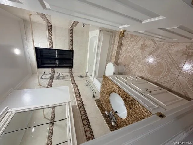 Full bathroom with vanity. Full bathroom with vanity.
