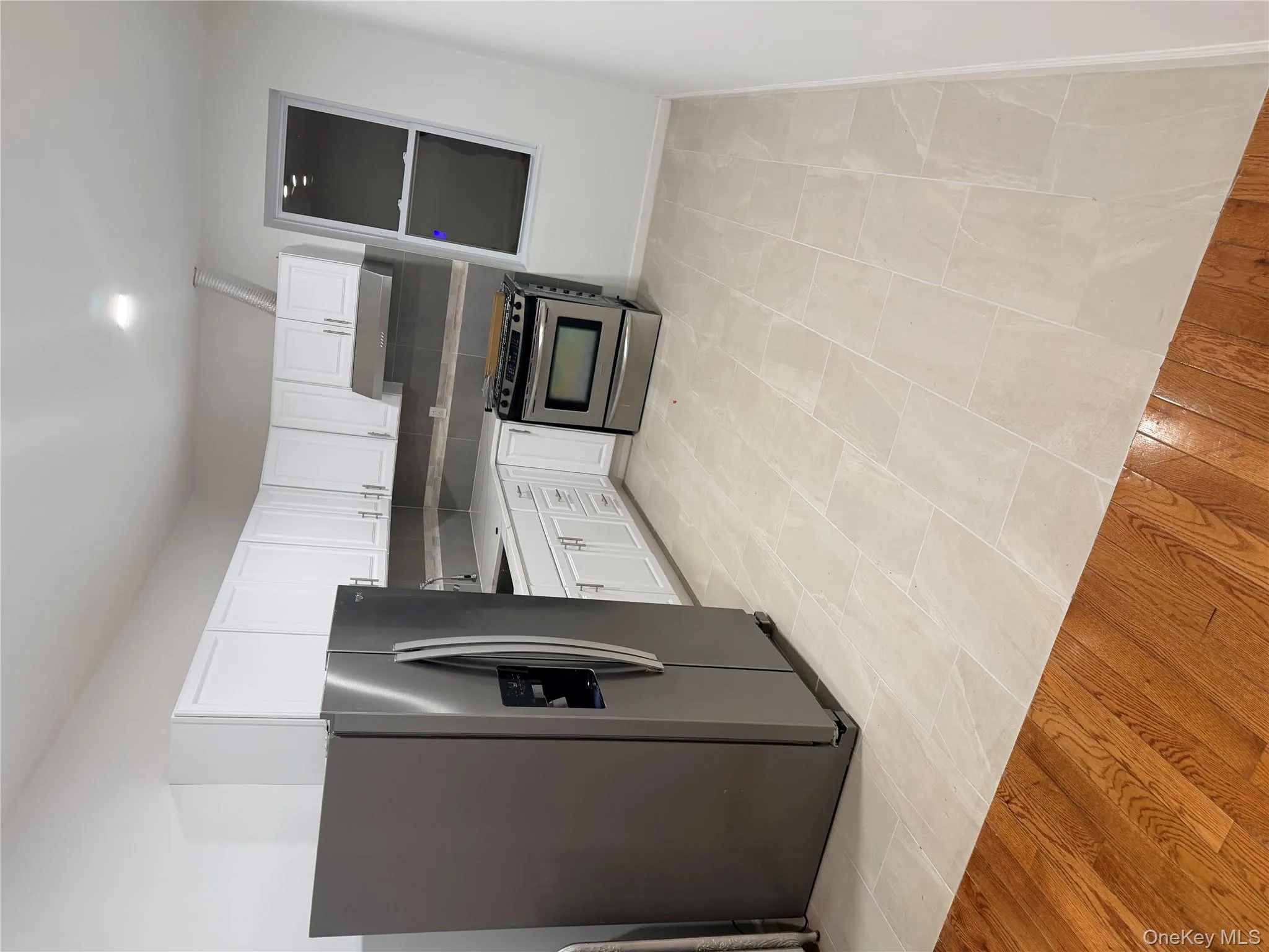 Kitchen with stainless steel appliances, new cabinets Kitchen with stainless steel appliances, new cabinets