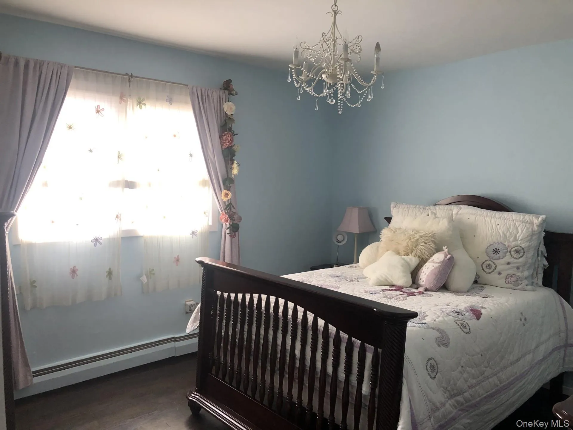Nice sized Bedroom featuring a chandelier. Nice sized Bedroom featuring a chandelier.