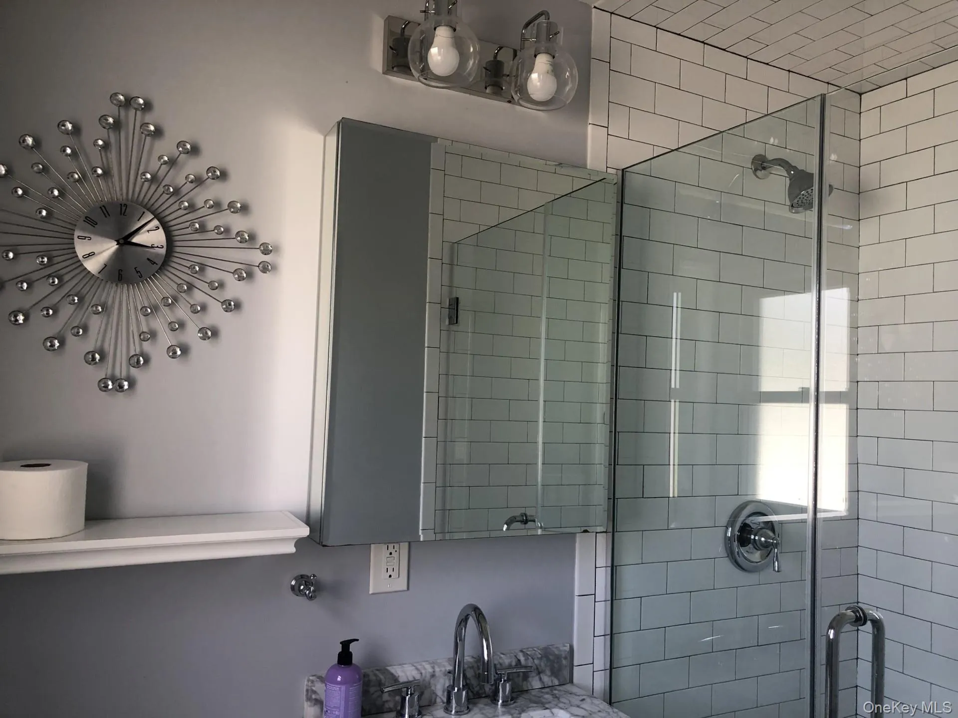 Primary Bathroom featuring a shower stall Primary Bathroom featuring a shower stall