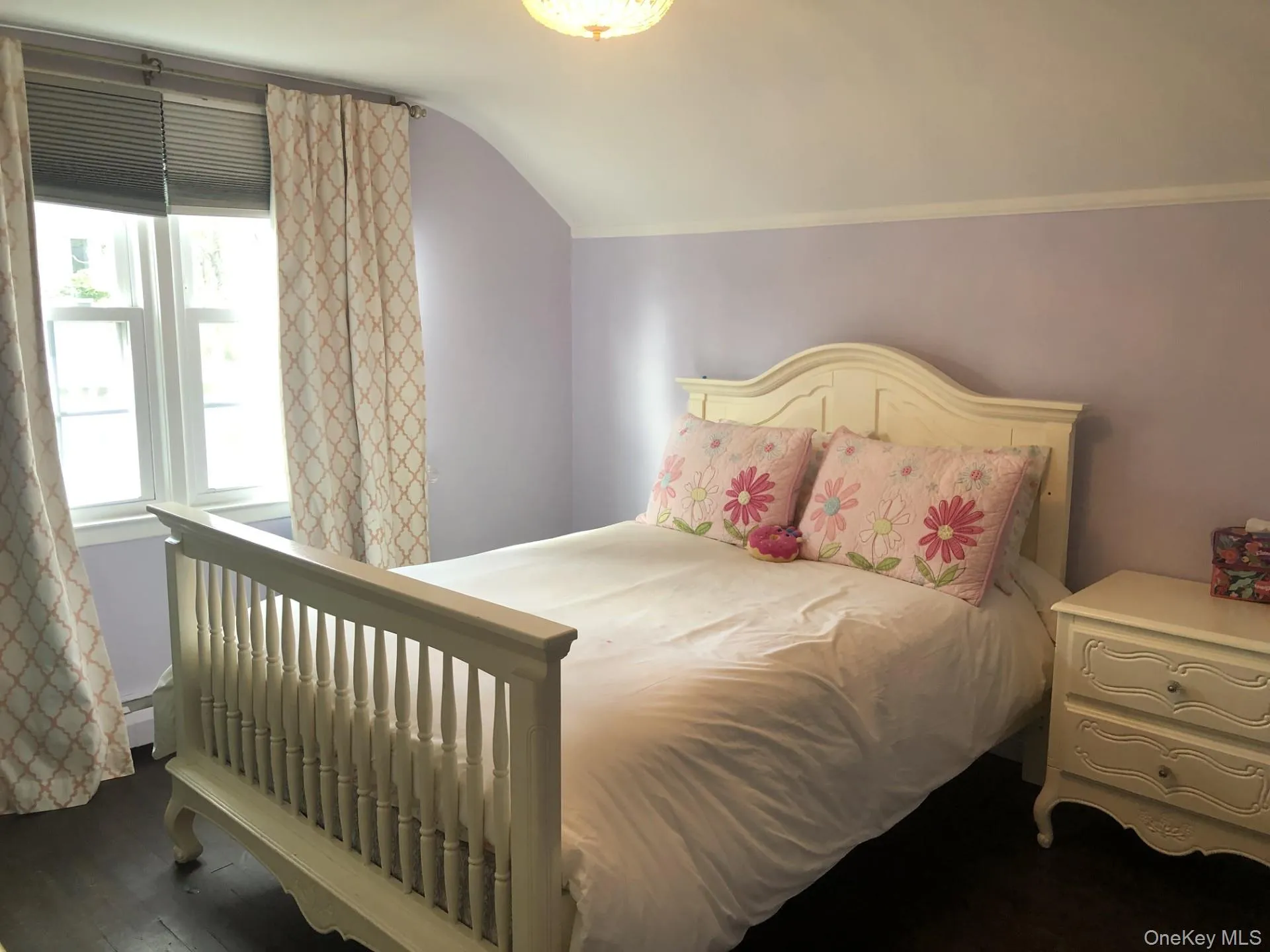 Nice sized Bedroom featuring wood finished floors Nice sized Bedroom featuring wood finished floors