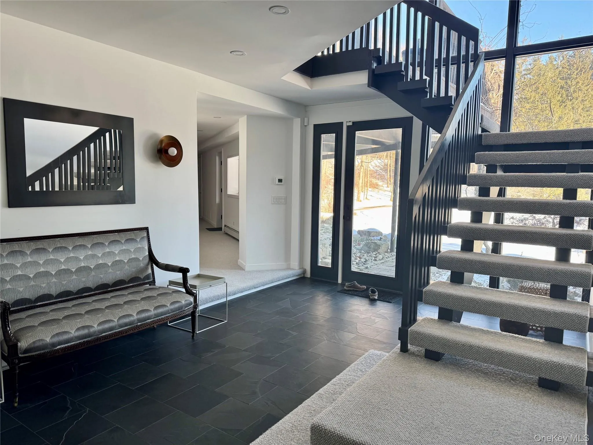 Foyer entrance with stairs leading upstairs Foyer entrance with stairs leading upstairs