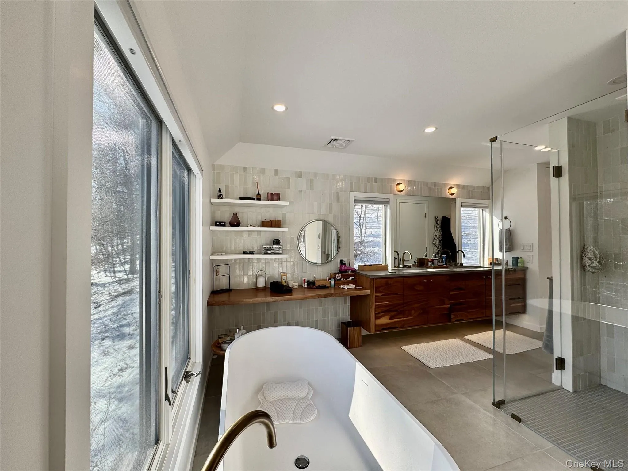 Primary bath with soaking tub, walk-in shower and double vanity Primary bath with soaking tub, walk-in shower and double vanity