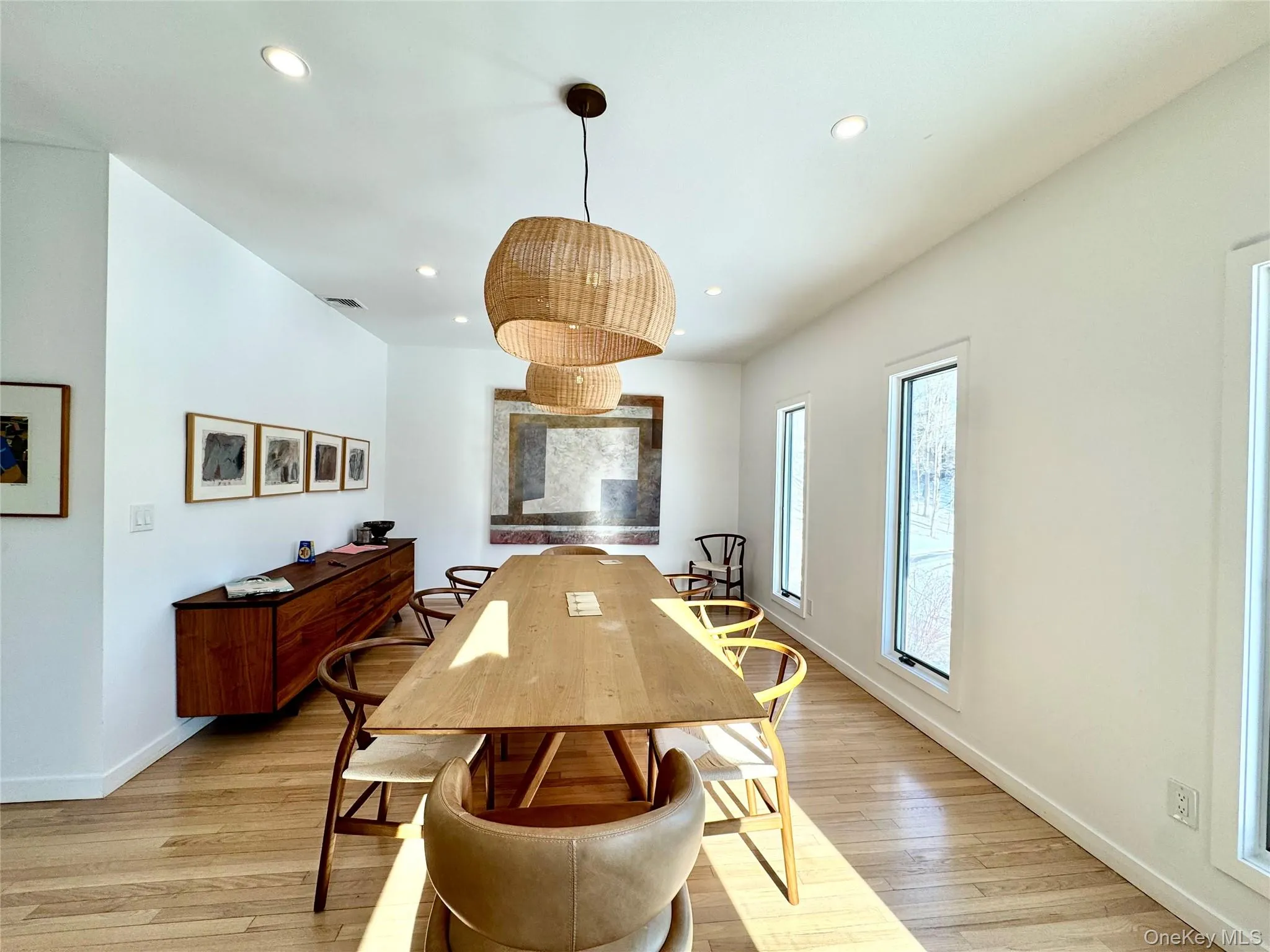Beautiful dining room flows off of open kitchen Beautiful dining room flows off of open kitchen
