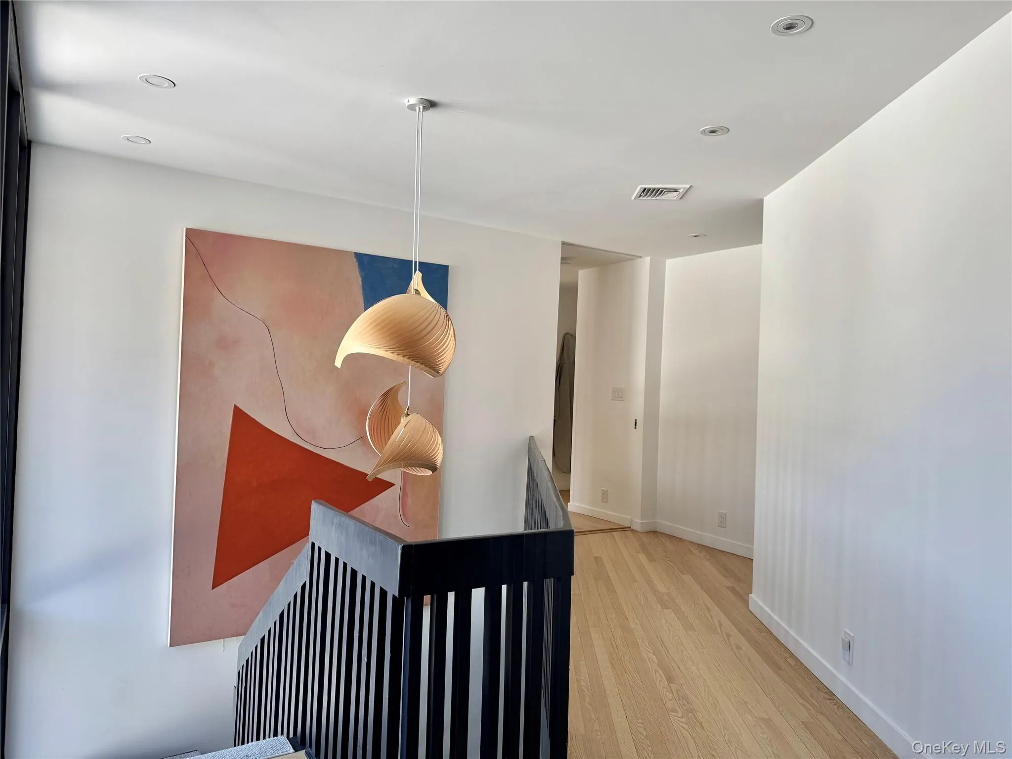 Hallway to primary suite Hallway to primary suite