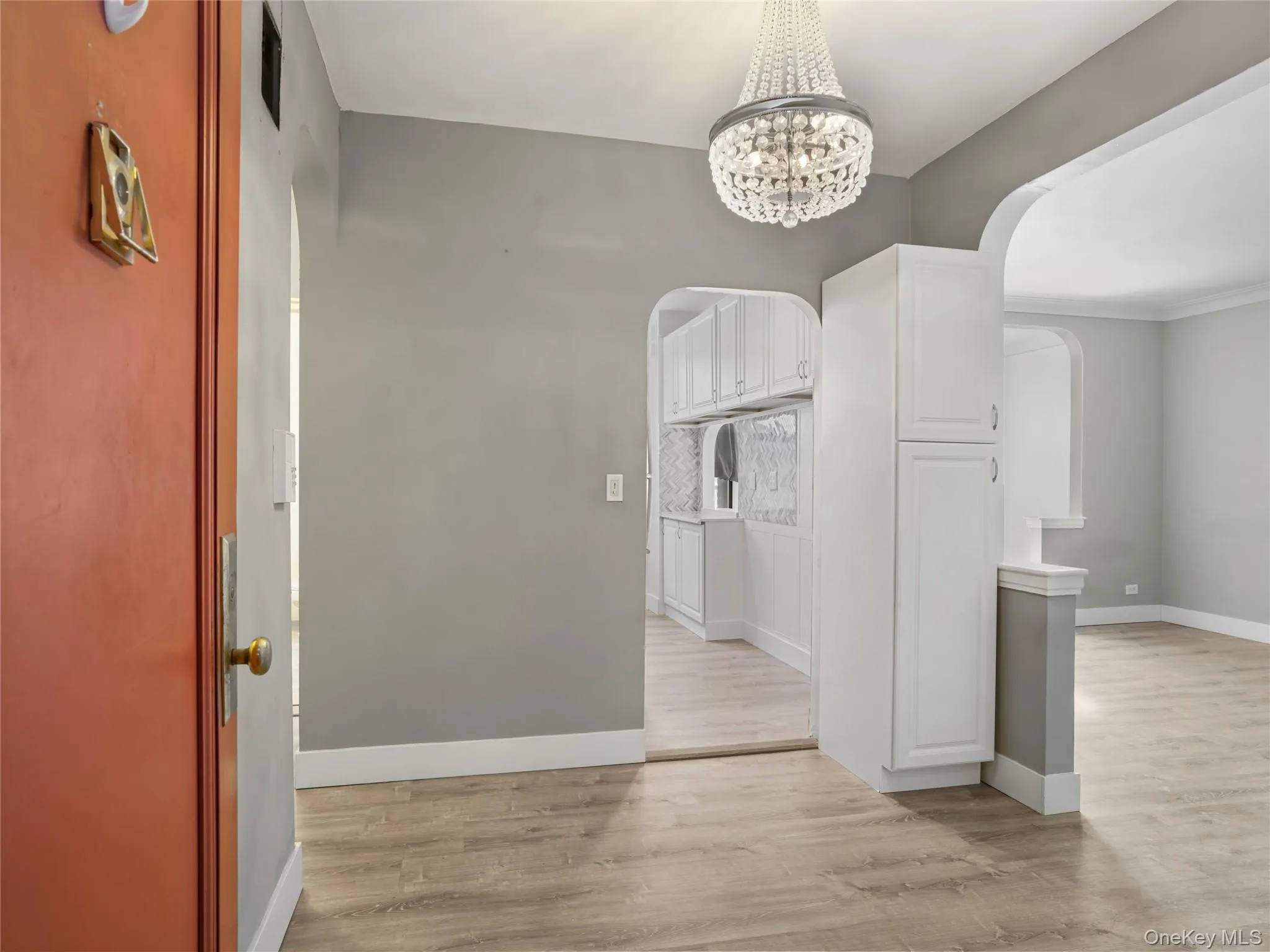 Entry leads to the living room and kitchen on the left. Entry leads to the living room and kitchen on the left.