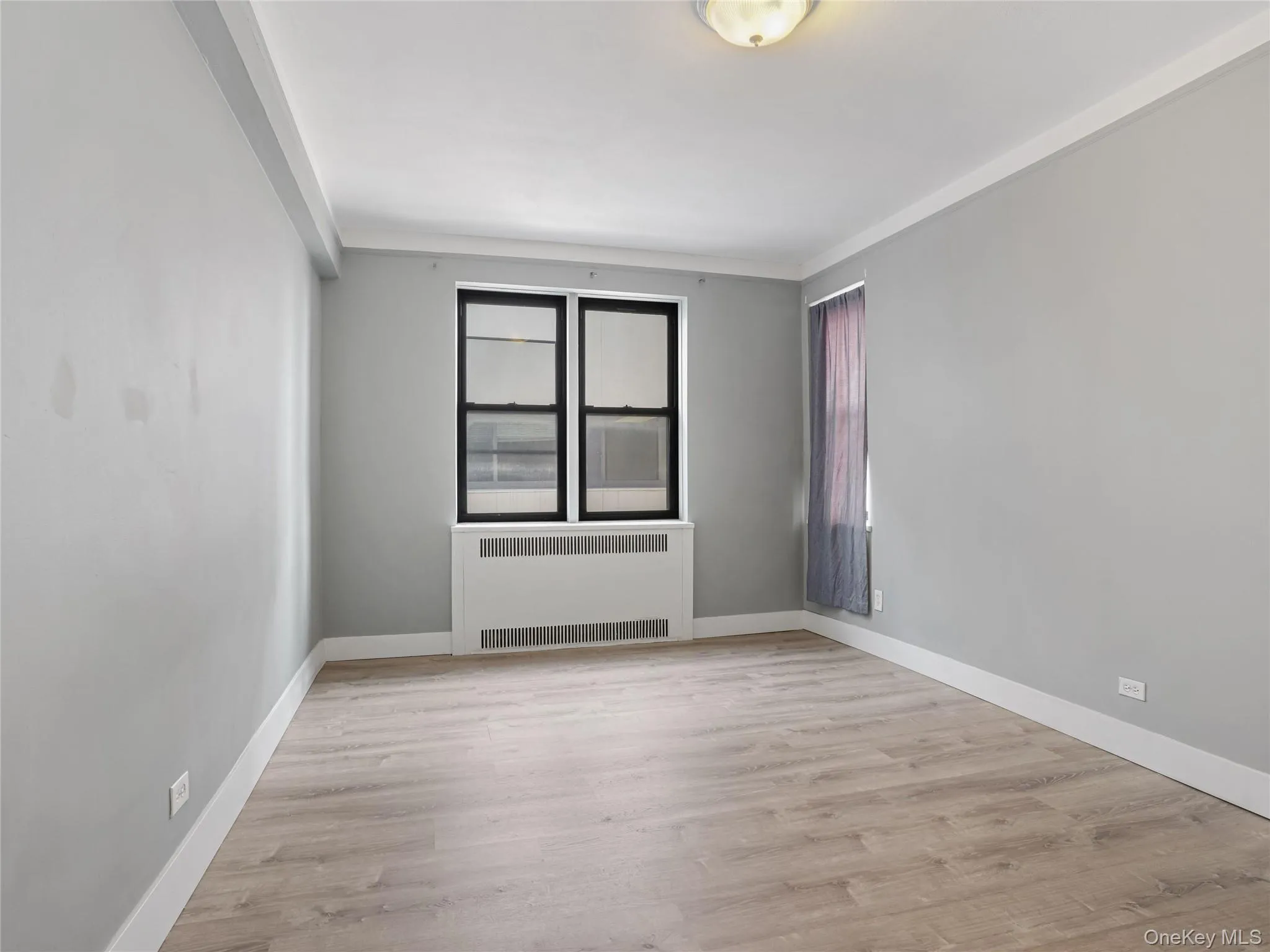 Spare room View of bedroom from doorway shows double window Spare room View of bedroom from doorway shows double window