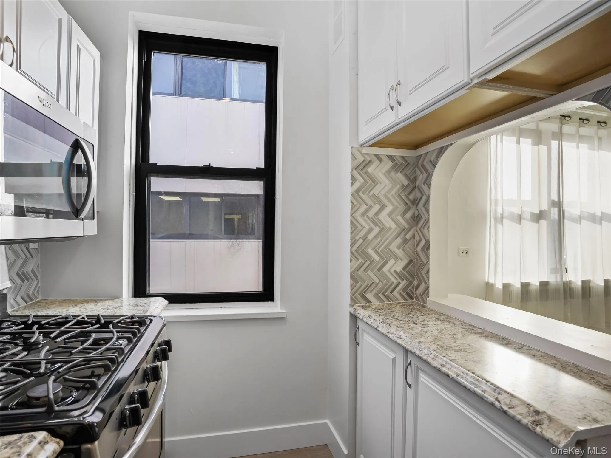 Kitchen has opening to the dining area Kitchen has opening to the dining area