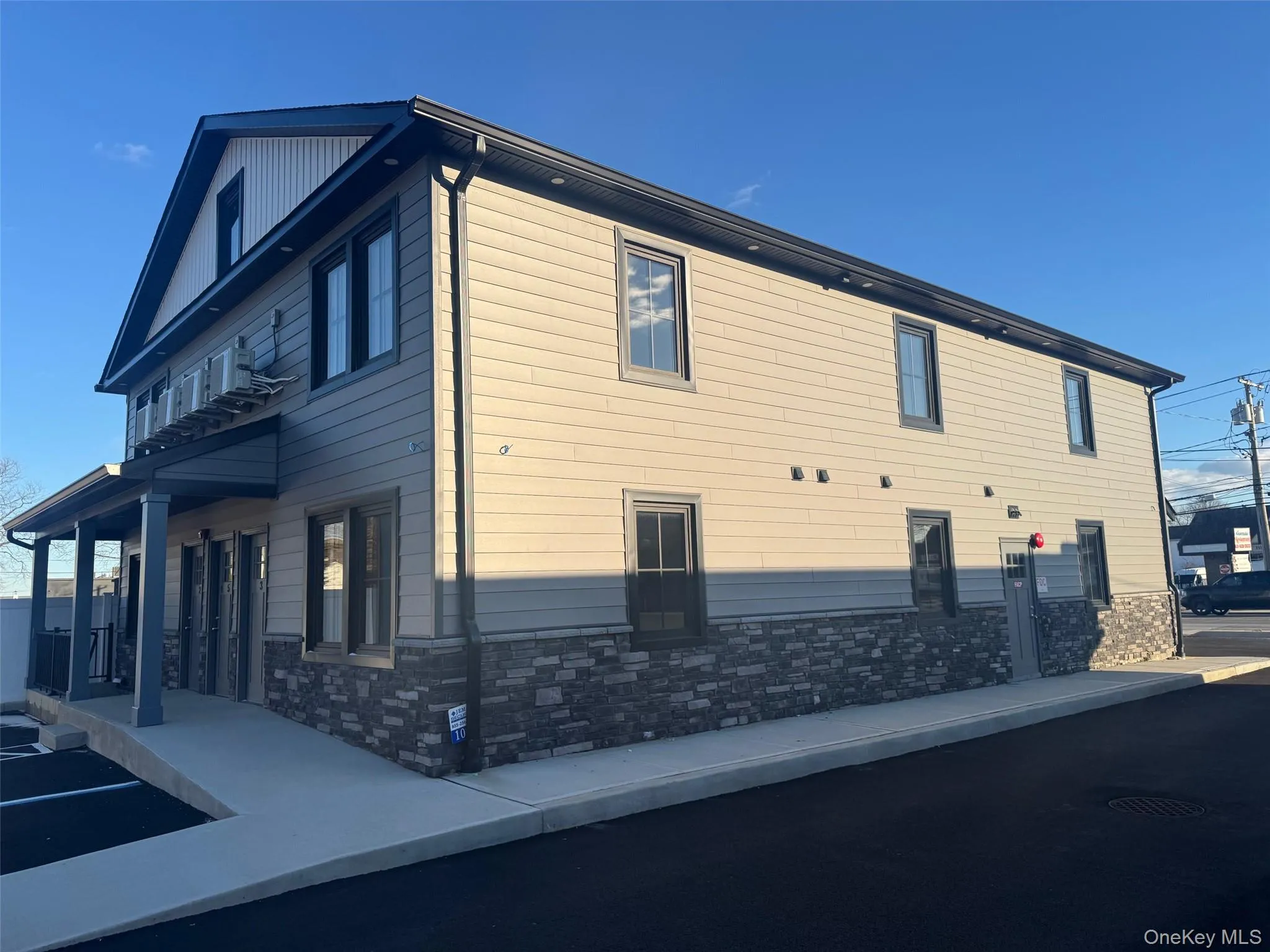 View of home's exterior with stone siding View of home's exterior with stone siding