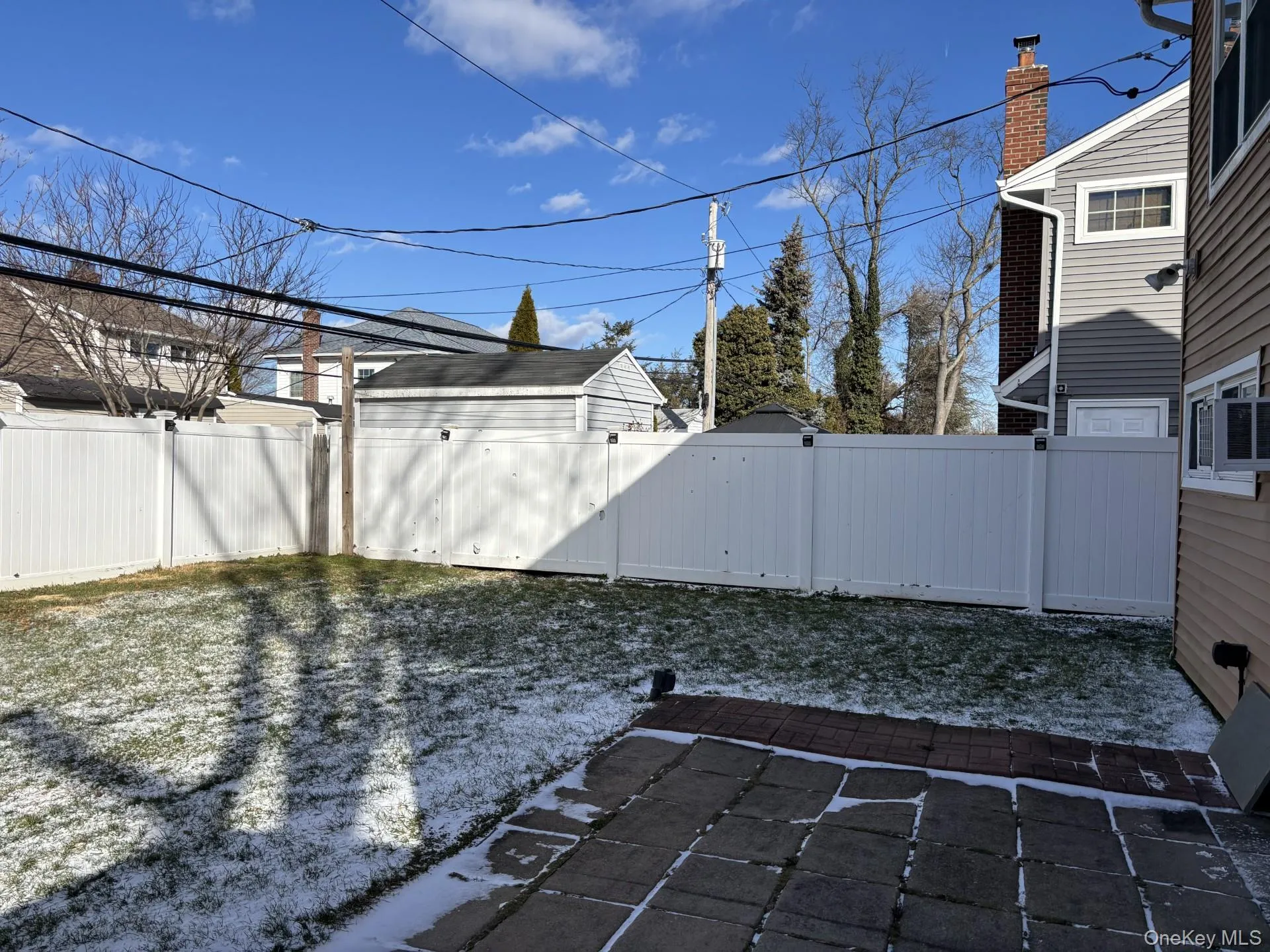 Fenced backyard featuring a patio Fenced backyard featuring a patio