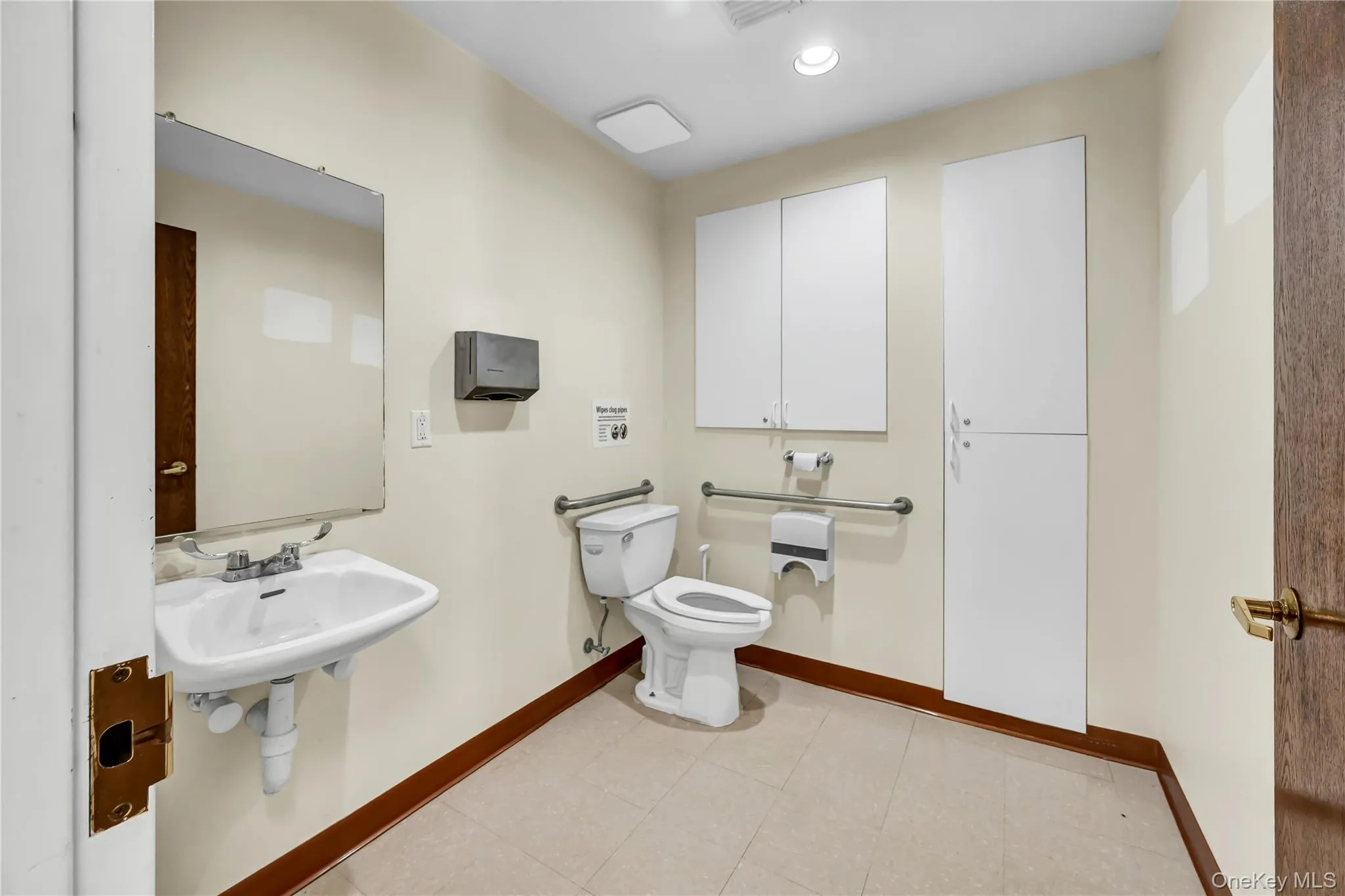 Bathroom with toilet and recessed lighting Bathroom with toilet and recessed lighting