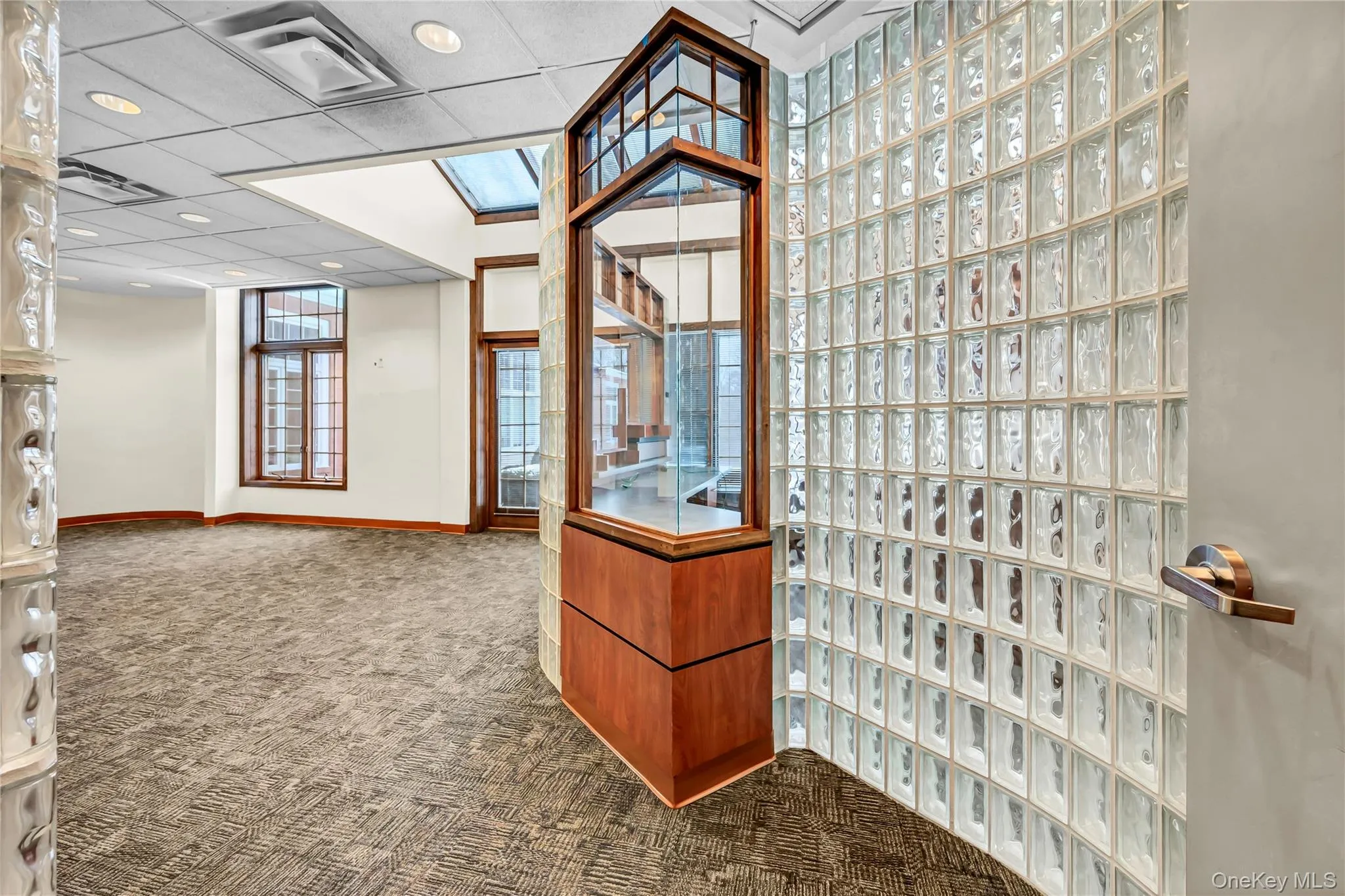 Welcome area featuring a drop ceiling Welcome area featuring a drop ceiling