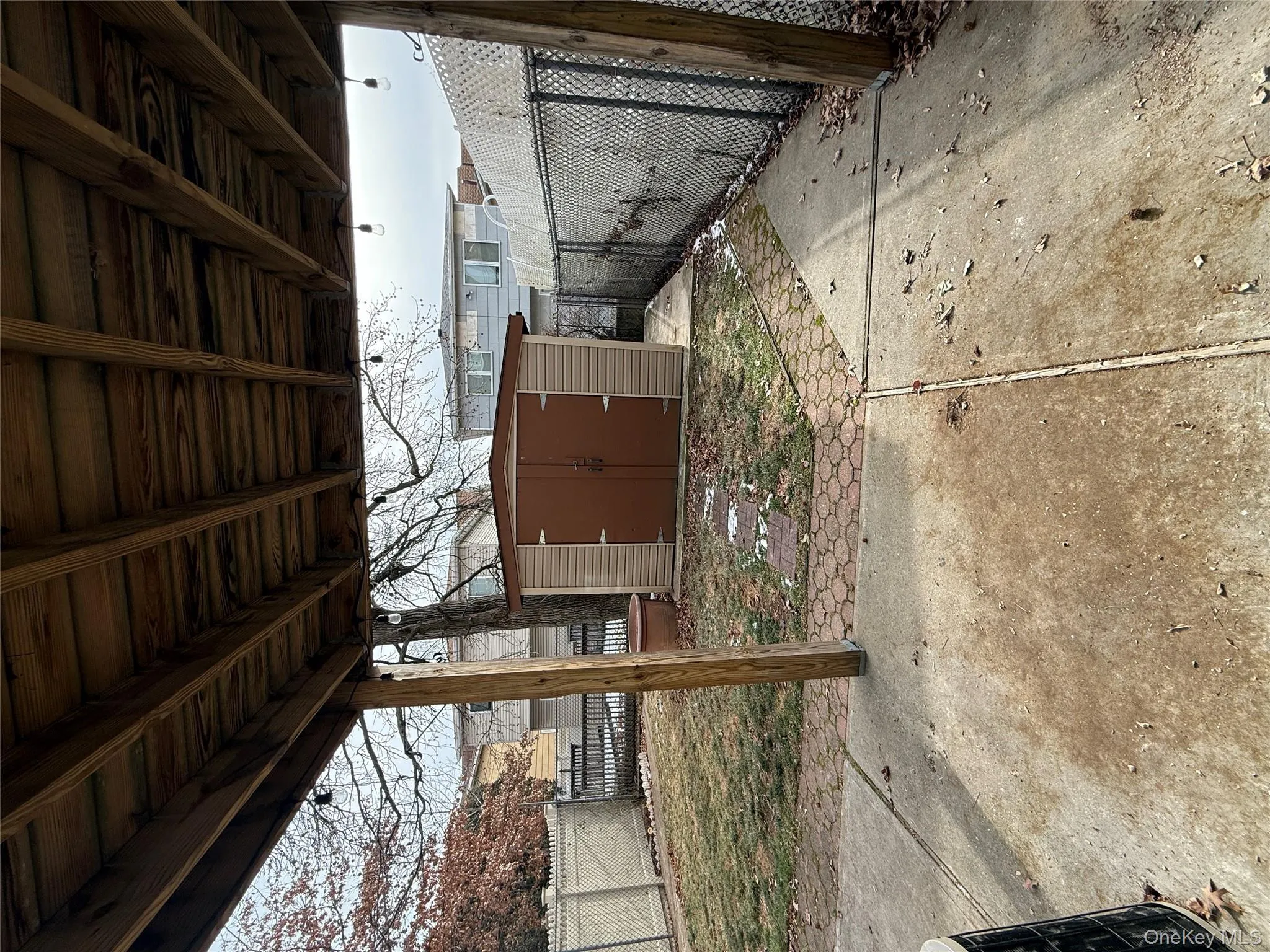 Fenced backyard featuring a shed and a patio Fenced backyard featuring a shed and a patio