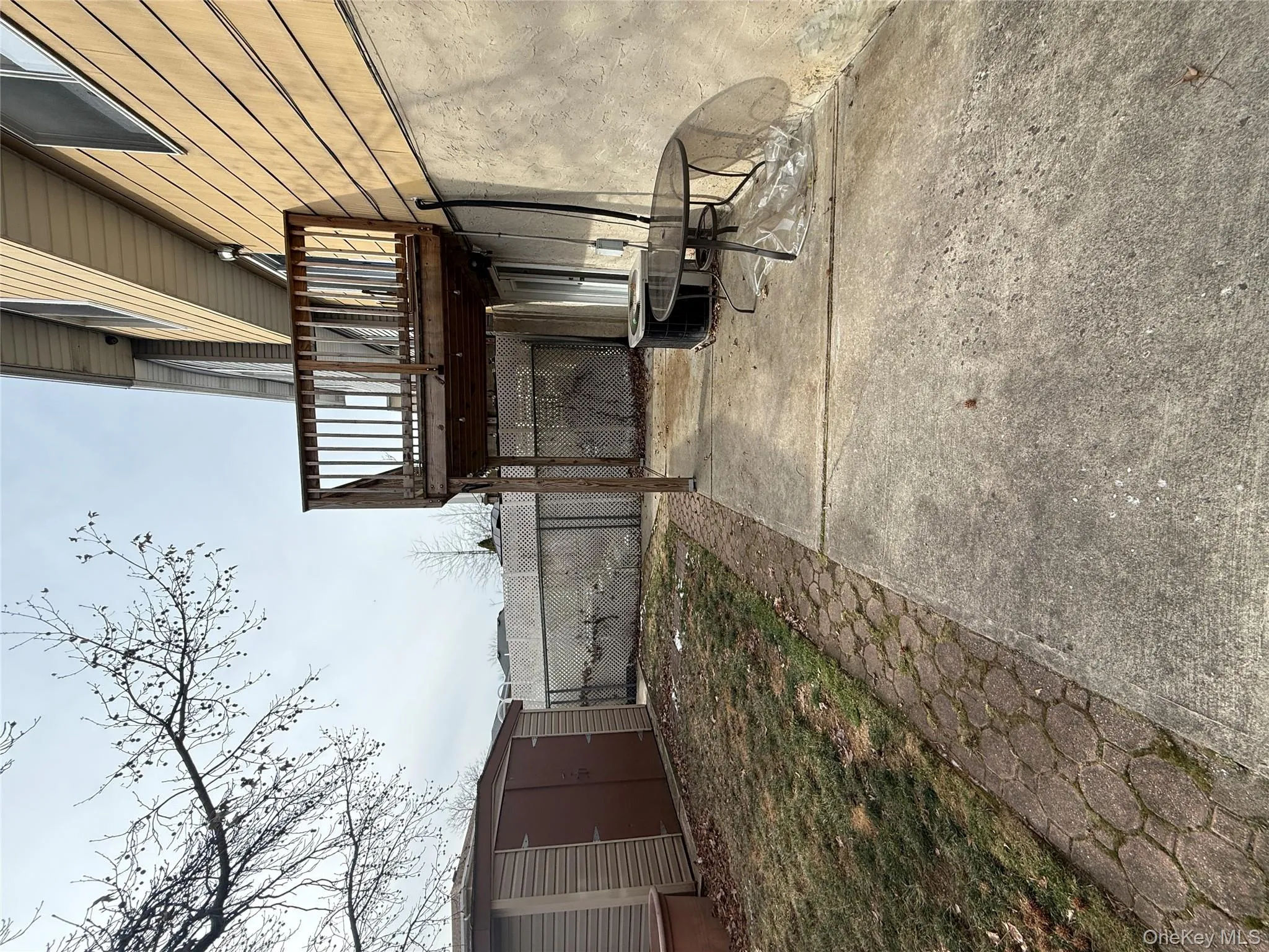 View of patio / terrace with a shed and a wooden deck View of patio / terrace with a shed and a wooden deck