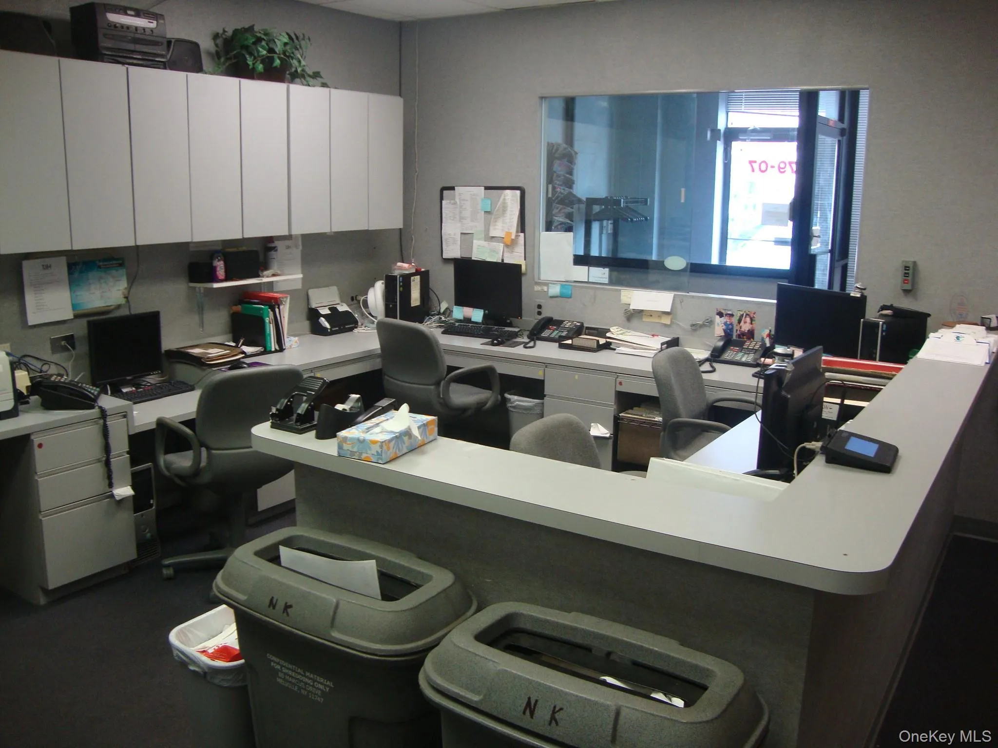 Reception office area with built in desk. Other view. Reception office area with built in desk. Other view.