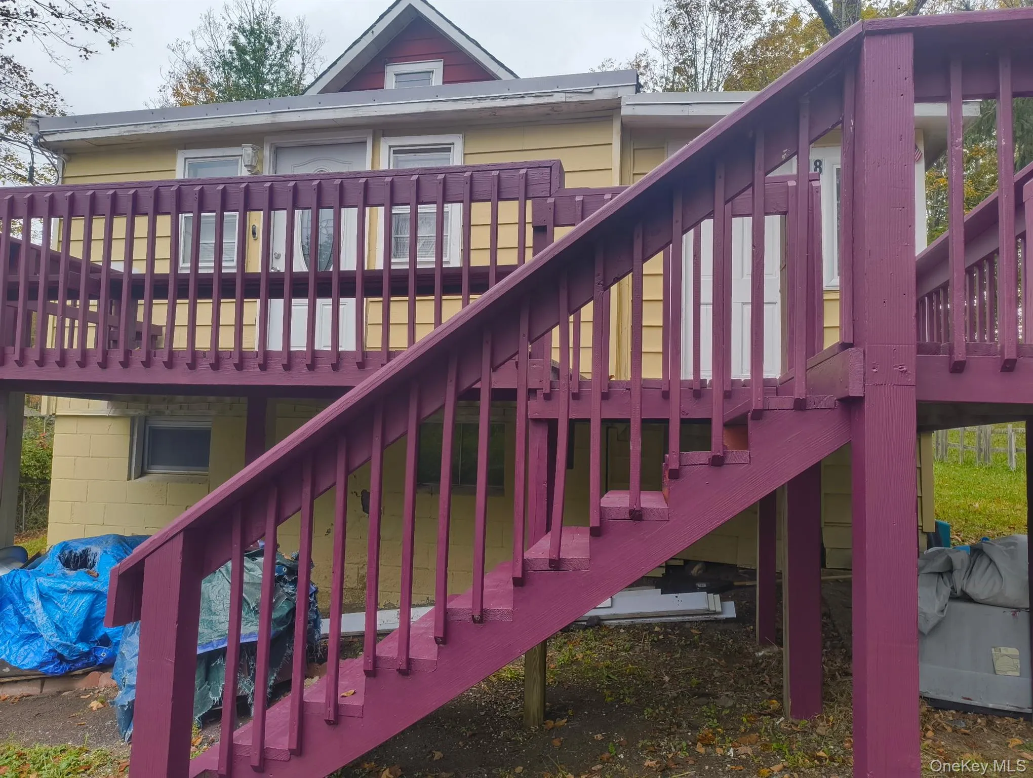 Wooden deck featuring stairs and grilling area Wooden deck featuring stairs and grilling area