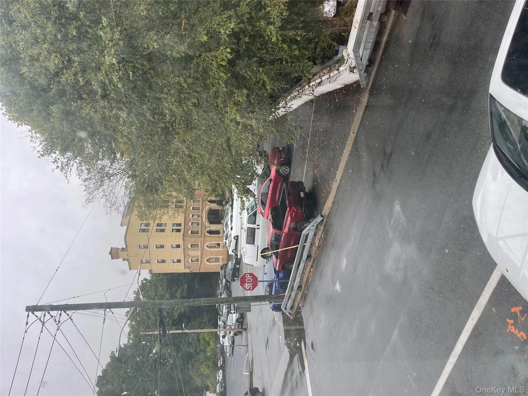 View of uncovered parking lot View of uncovered parking lot