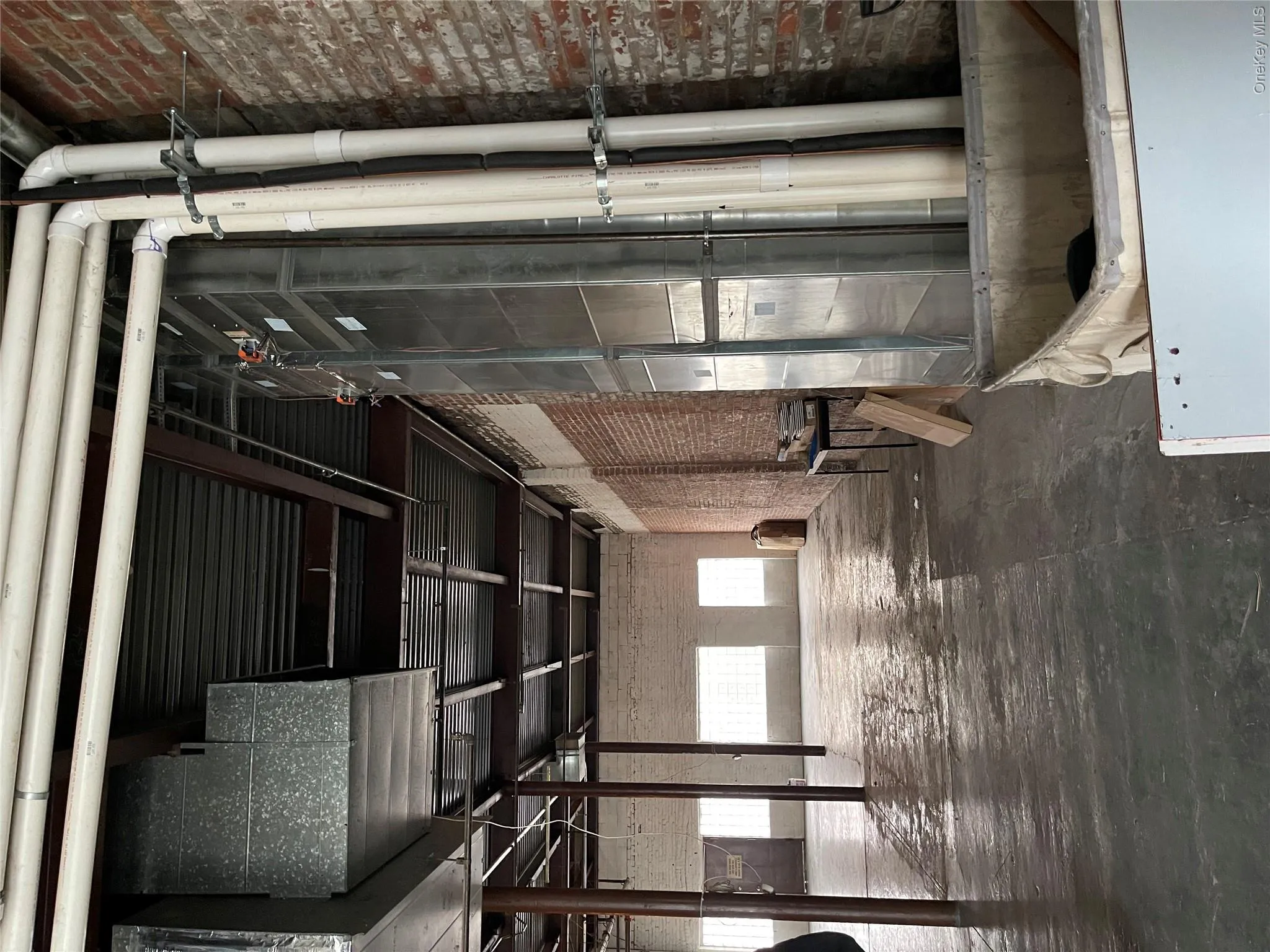 Miscellaneous room with brick wall Miscellaneous room with brick wall