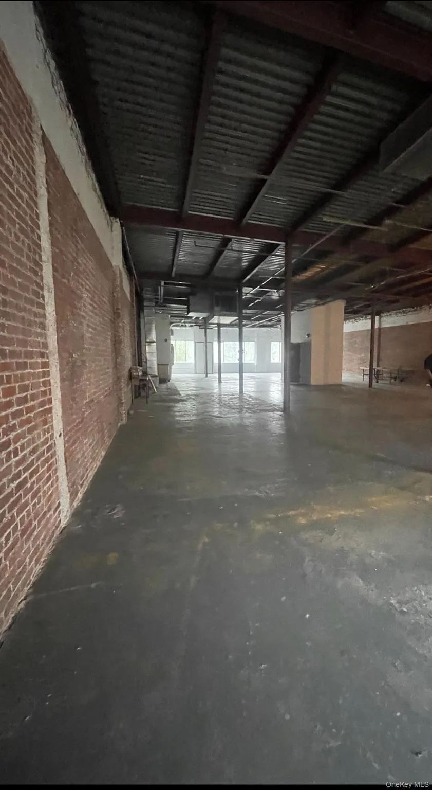 Miscellaneous room with brick wall Miscellaneous room with brick wall