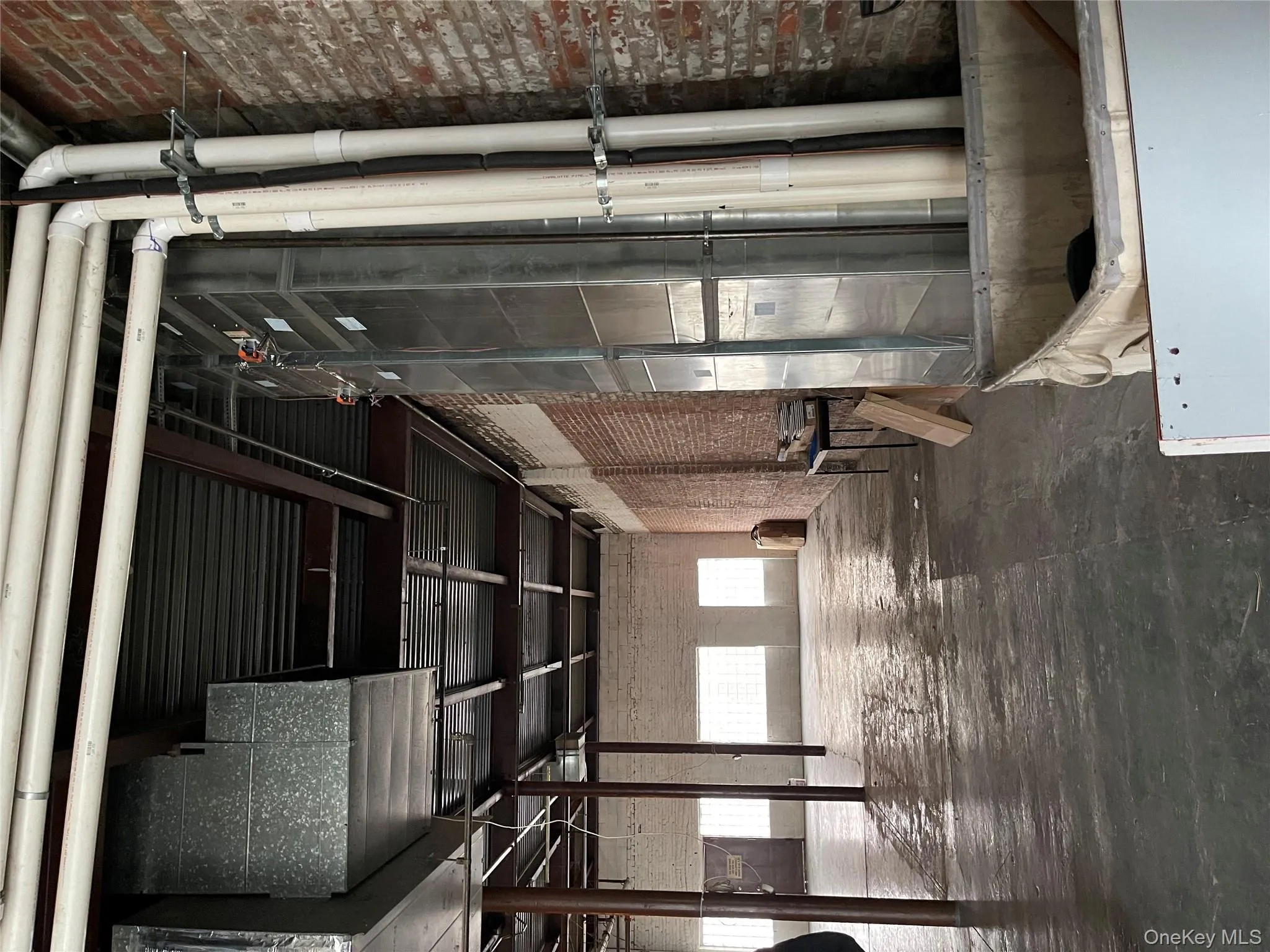 Miscellaneous room with brick wall Miscellaneous room with brick wall