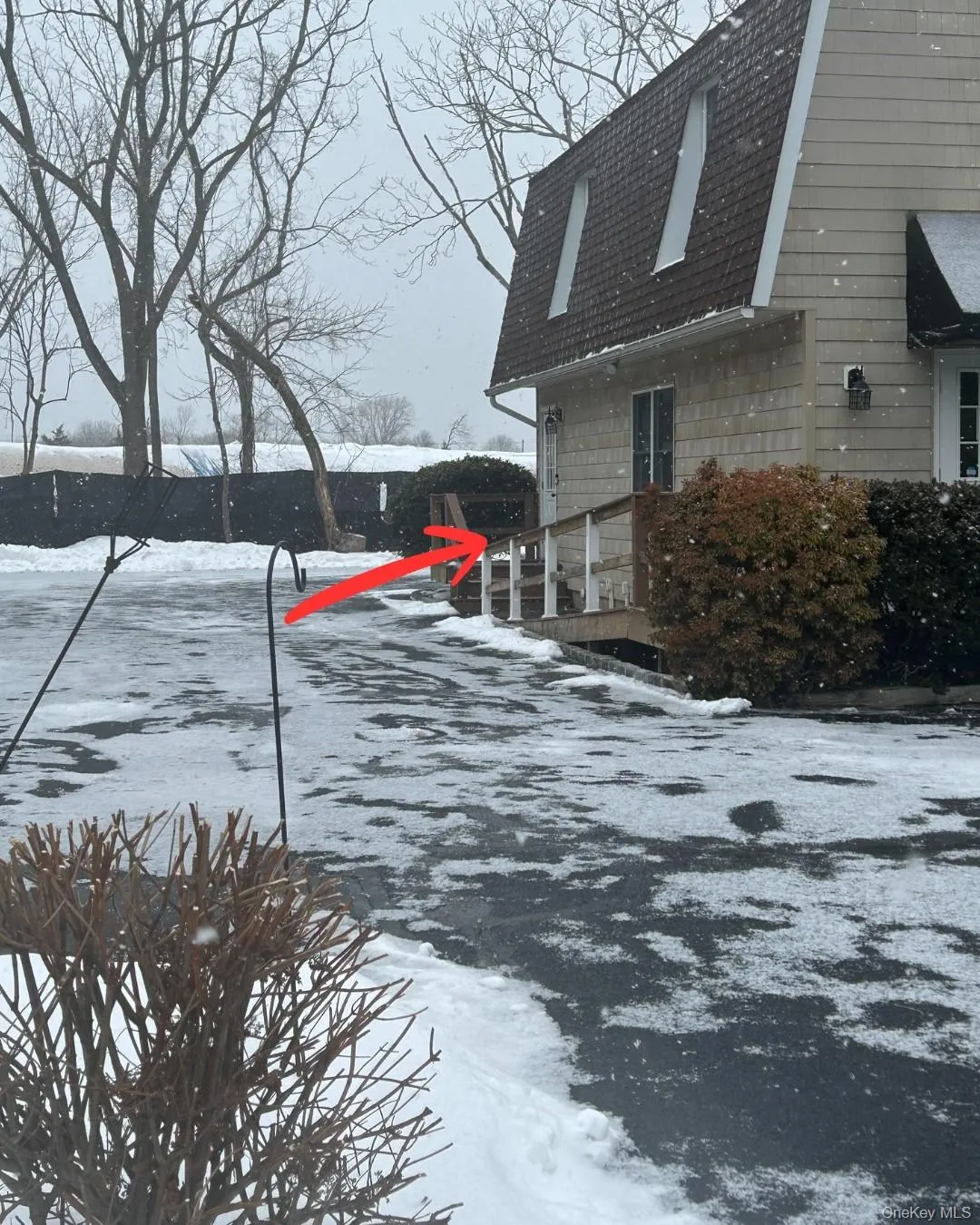 Entrance to office and parking on the side of building Entrance to office and parking on the side of building