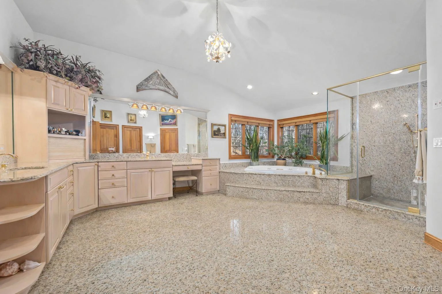 Granite bath with dual walk-in closets Granite bath with dual walk-in closets