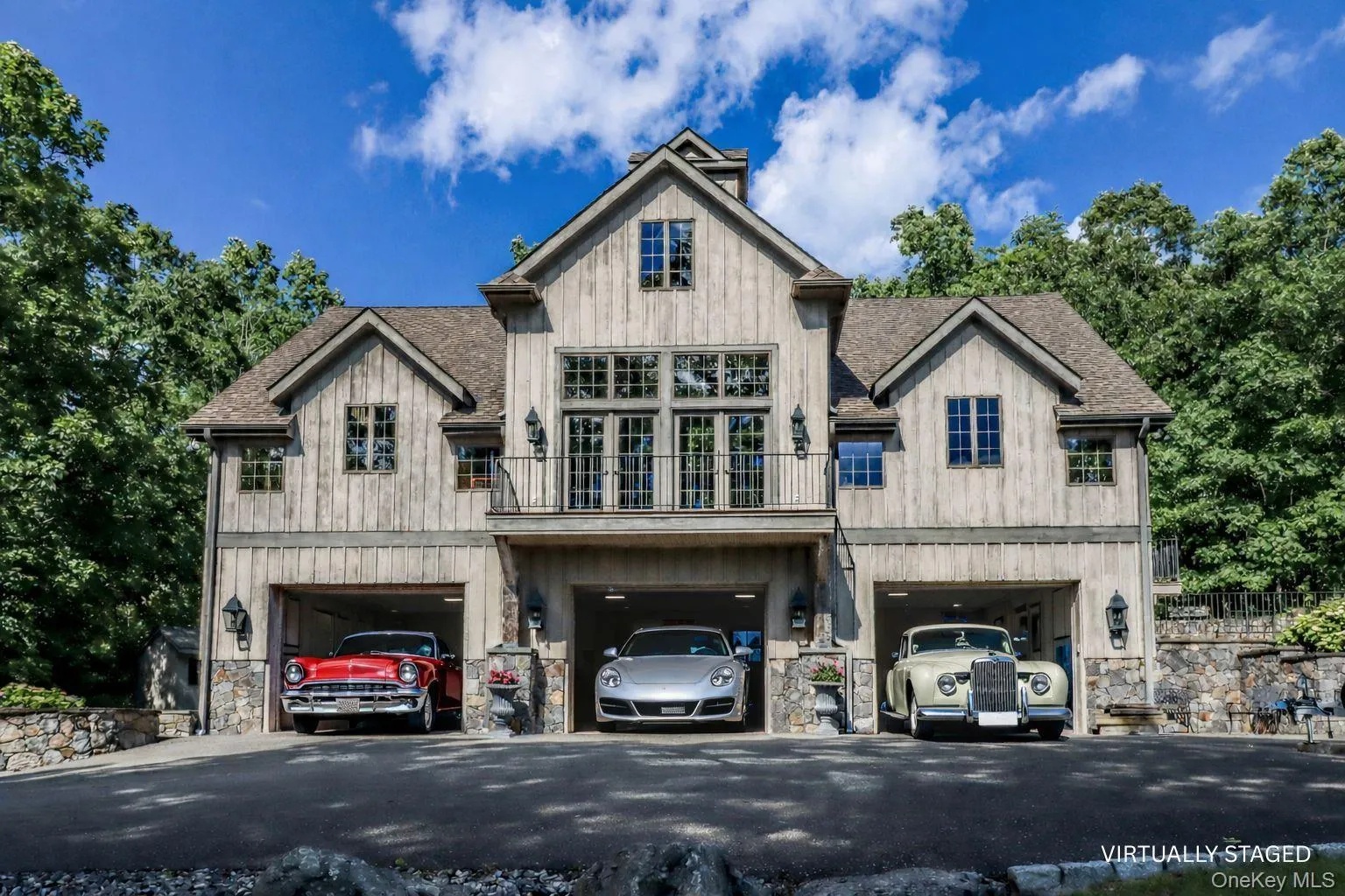 Cars virtually staged. 4,000 sq ft carriage barn with garage space for 12 cars Cars virtually staged. 4,000 sq ft carriage barn with garage space for 12 cars