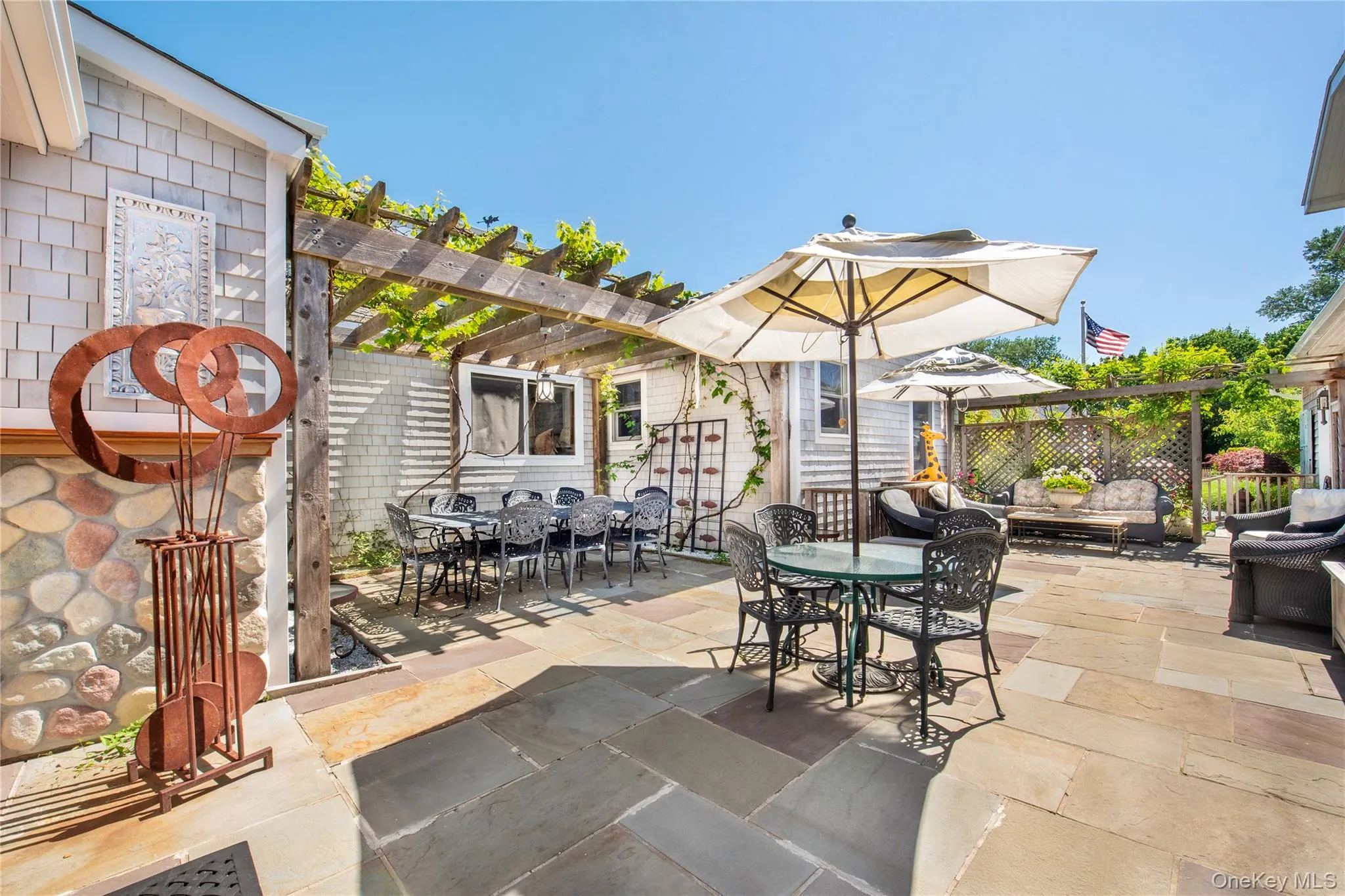 View of patio with a pergola and outdoor dining area View of patio with a pergola and outdoor dining area