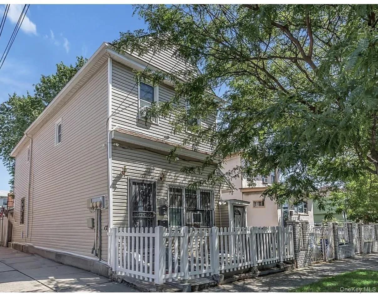View of front of home with a fenced front yard View of front of home with a fenced front yard