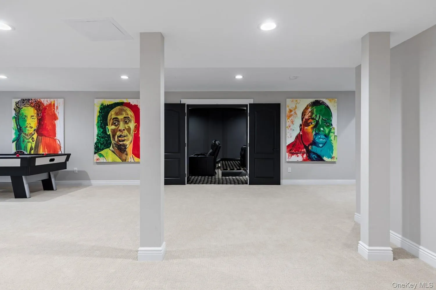 Basement featuring light colored carpet and recessed lighting Basement featuring light colored carpet and recessed lighting