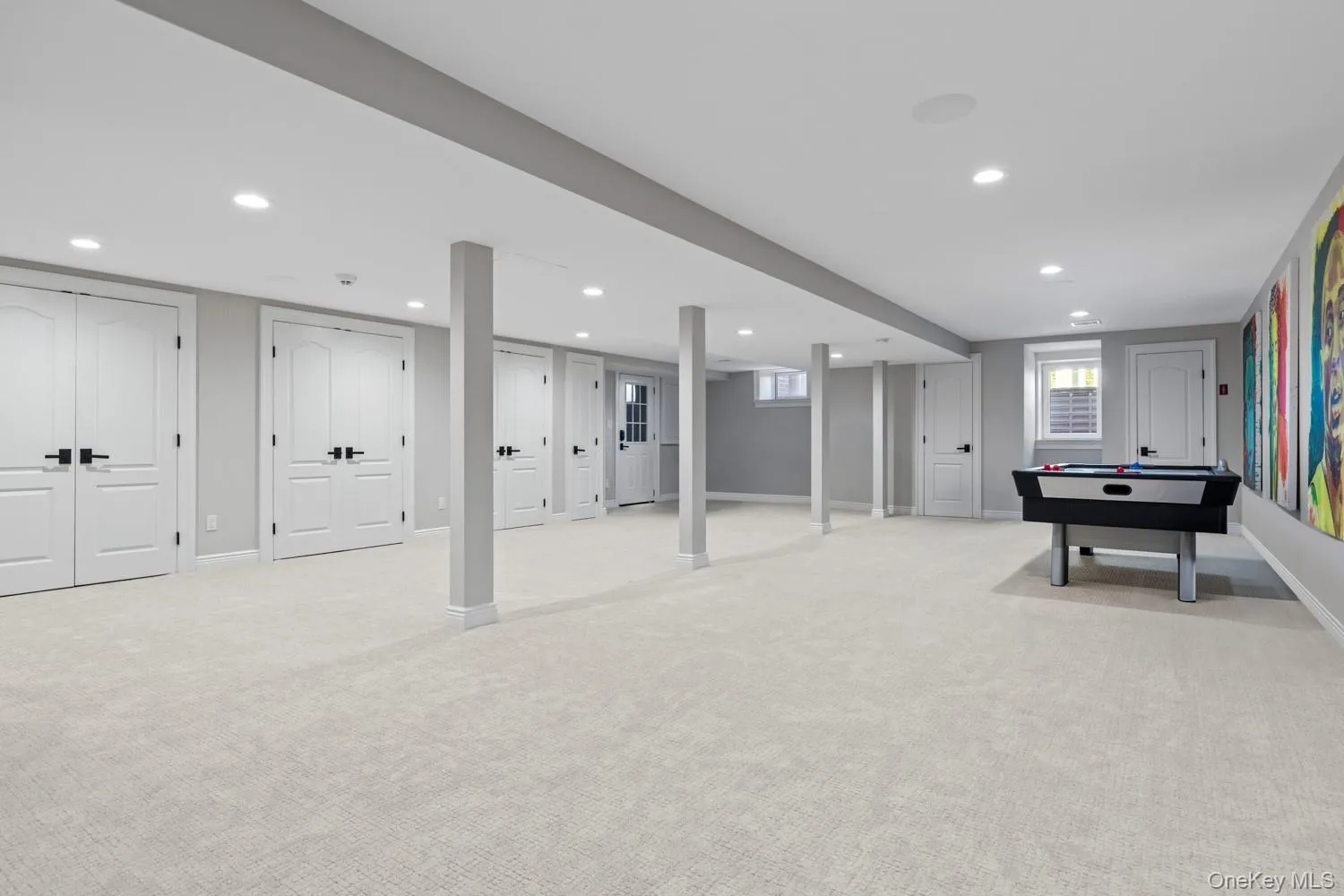Basement with light carpet and recessed lighting Basement with light carpet and recessed lighting