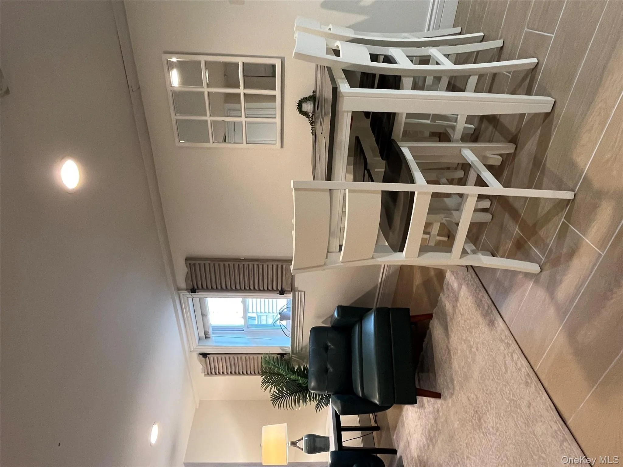Dining room featuring recessed lighting and wood finish floors Dining room featuring recessed lighting and wood finish floors