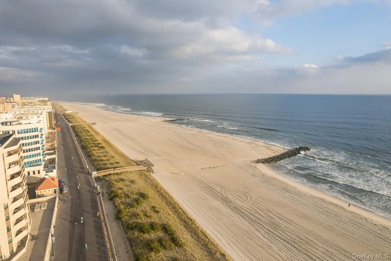 Water view featuring local beach Water view featuring local beach