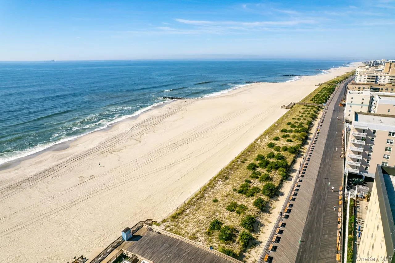 Bird's eye view of expansive beach Bird's eye view of expansive beach