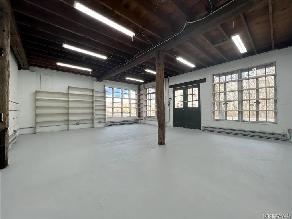 Entry space with baseboard heating units Entry space with baseboard heating units