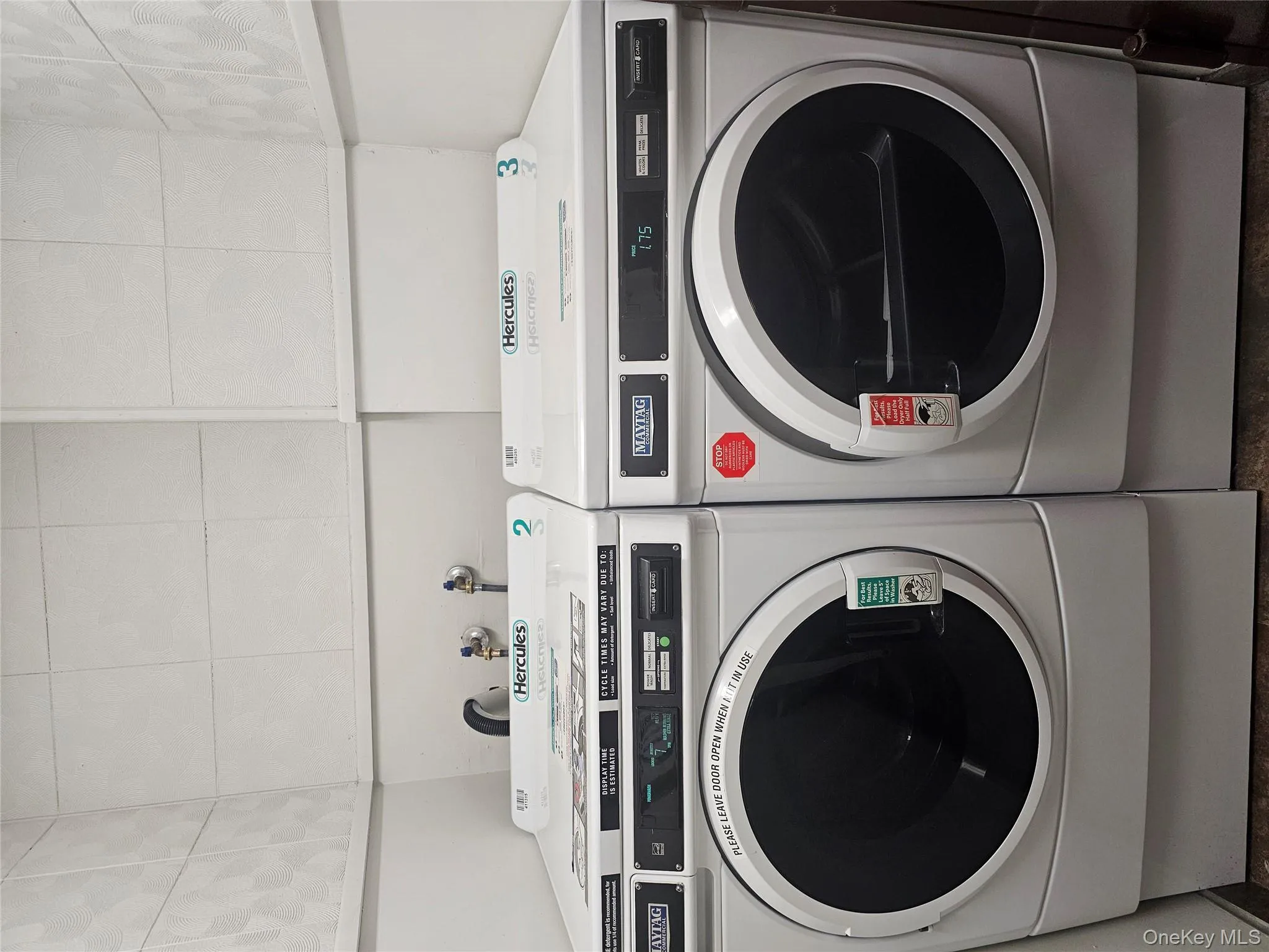 Laundry area featuring independent washer and dryer Laundry area featuring independent washer and dryer