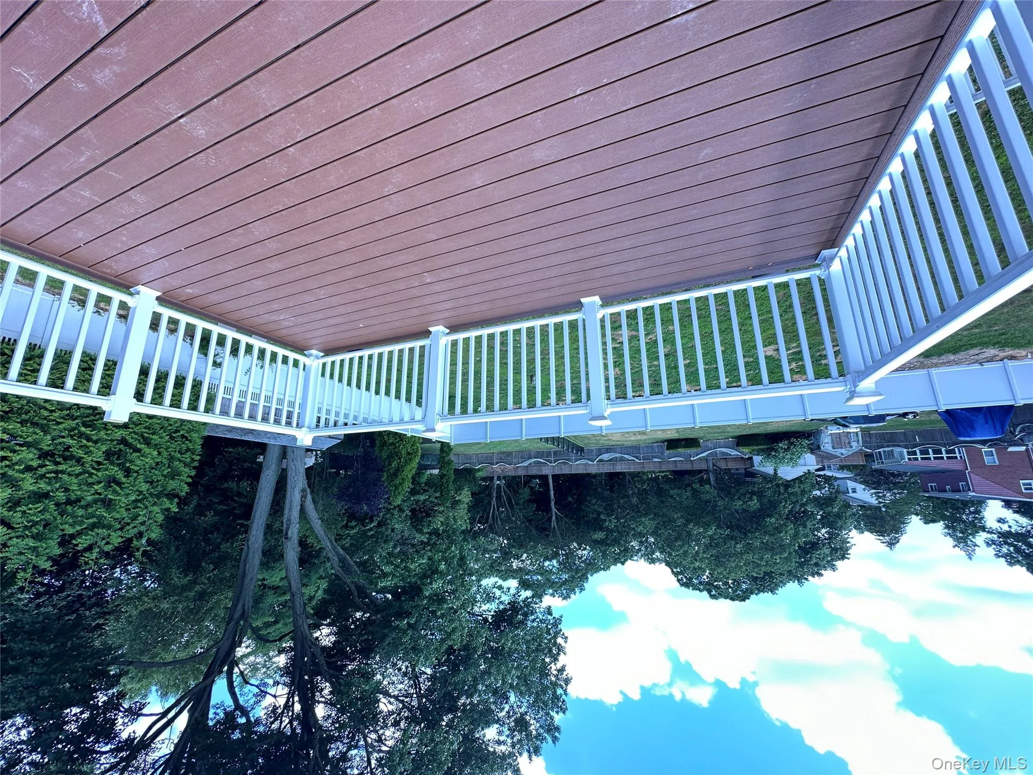 Deck with a fenced backyard Deck with a fenced backyard