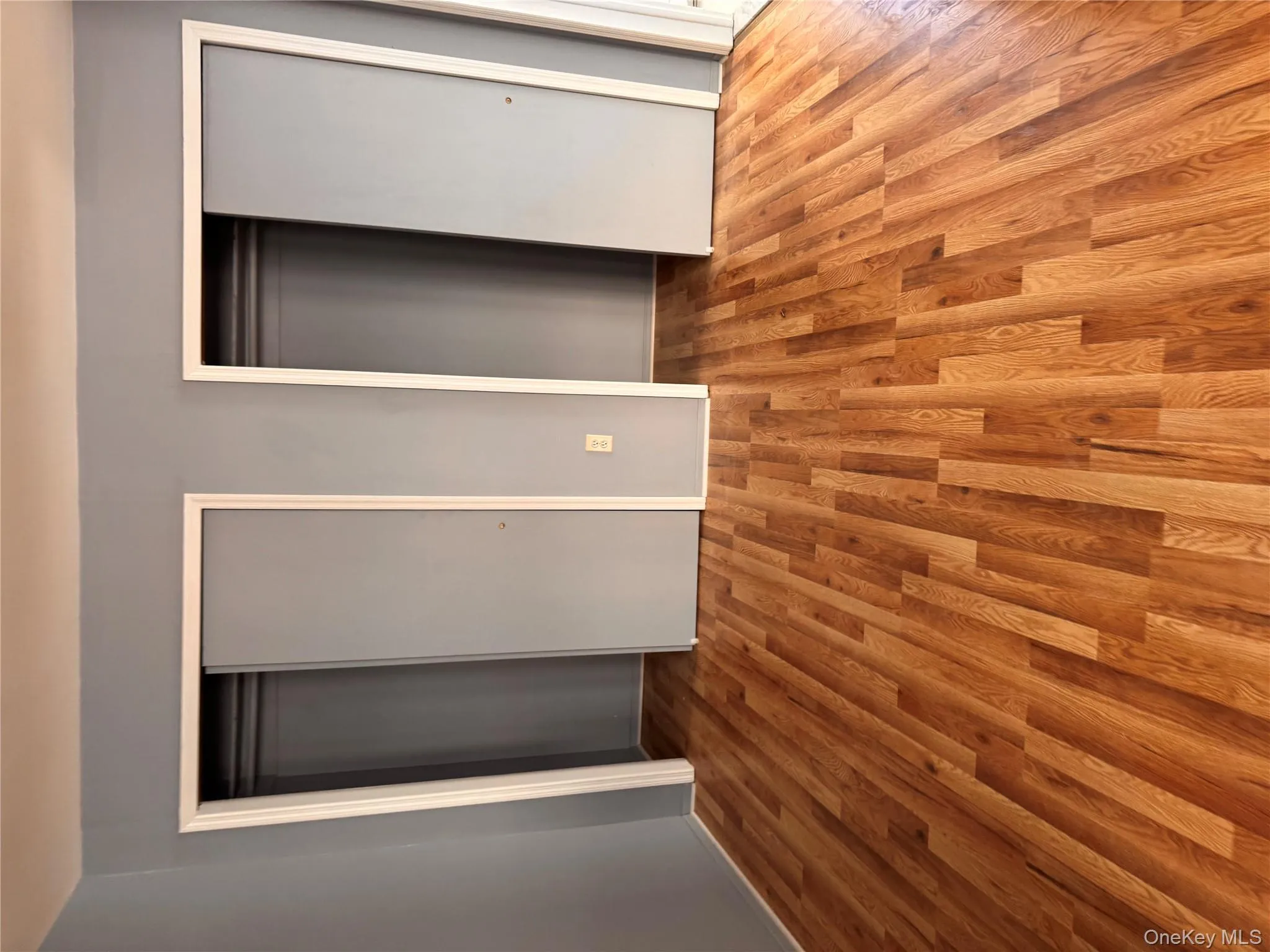 Unfurnished bedroom featuring two closets and light wood-style flooring Unfurnished bedroom featuring two closets and light wood-style flooring