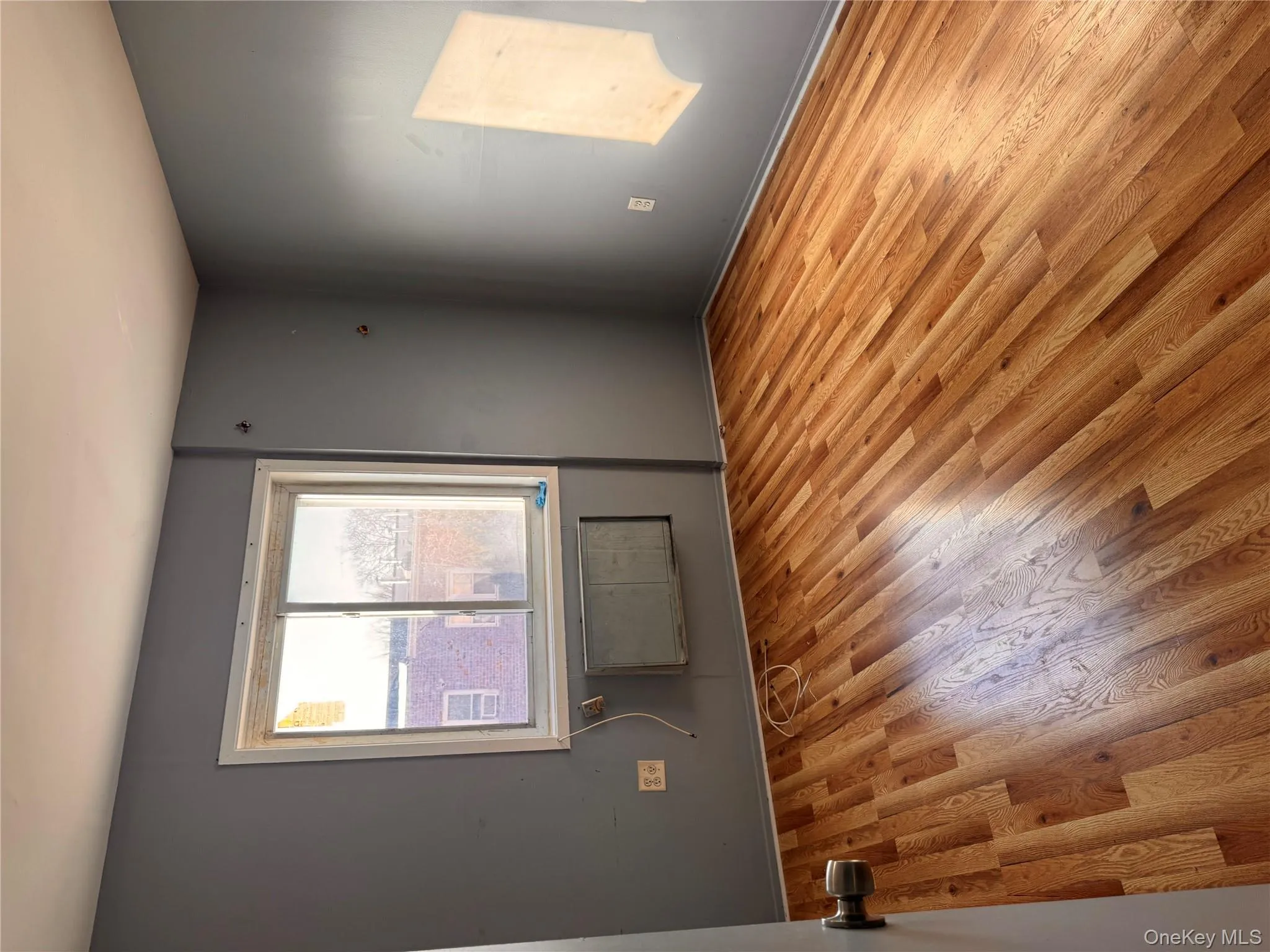 Spare room featuring light wood-style floors Spare room featuring light wood-style floors