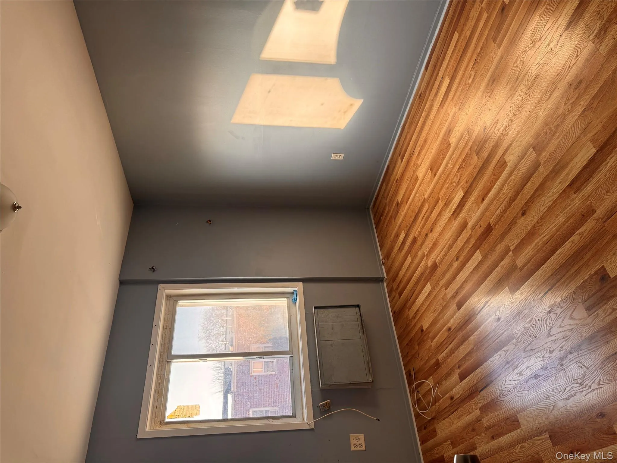 Empty room featuring wood finished floors Empty room featuring wood finished floors