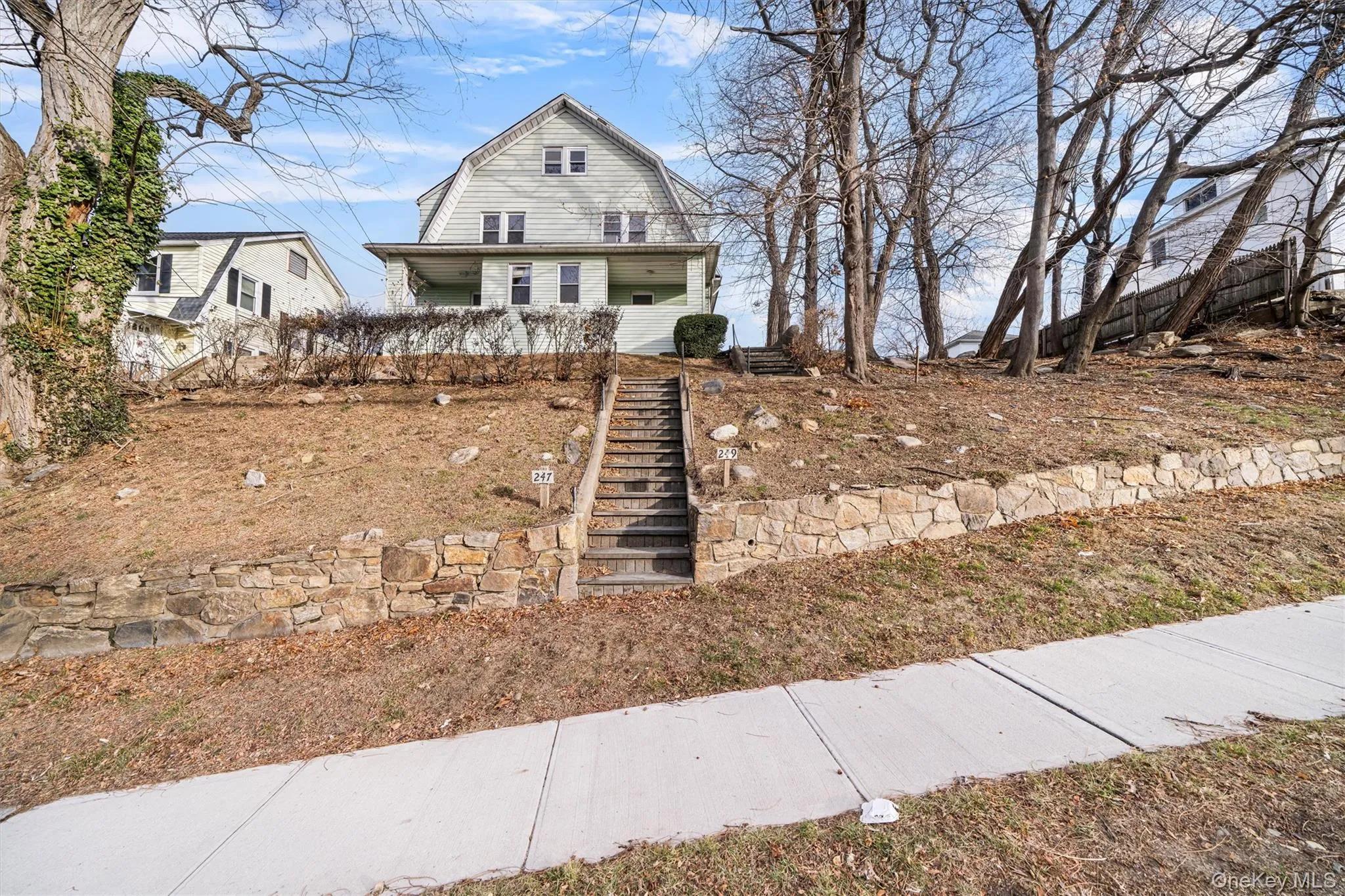 Dutch colonial with a gambrel roof and stairway Dutch colonial with a gambrel roof and stairway