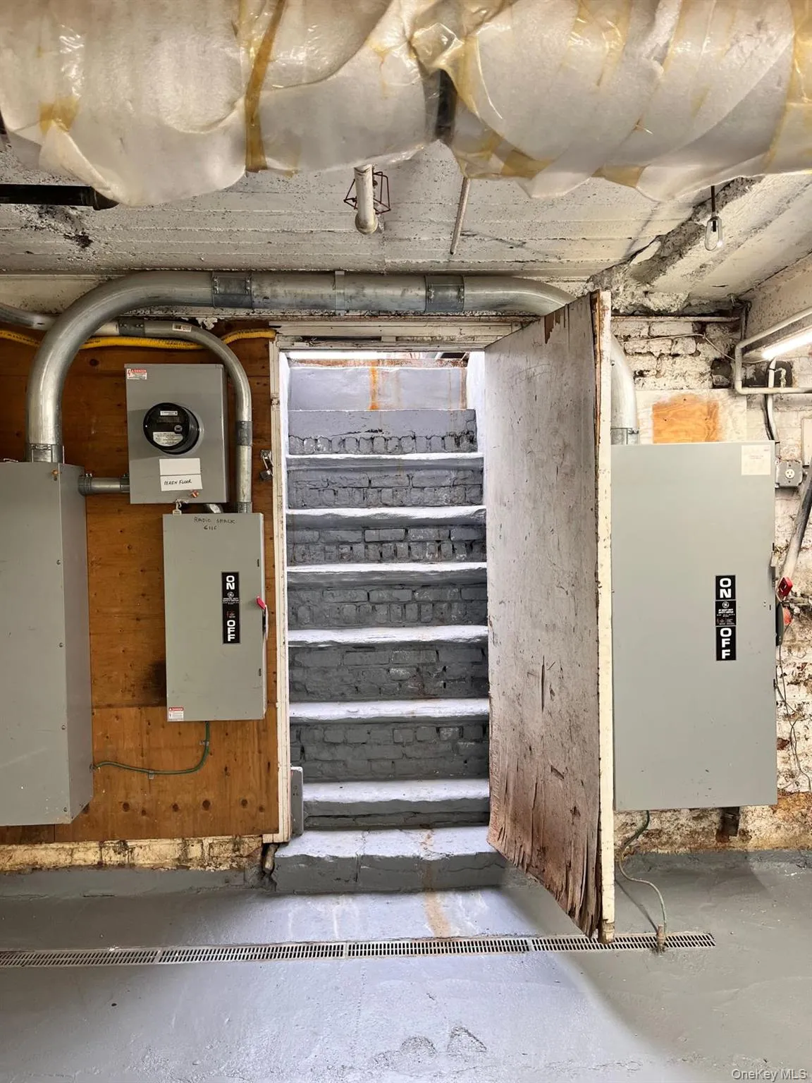 Utility room with electric panel Utility room with electric panel