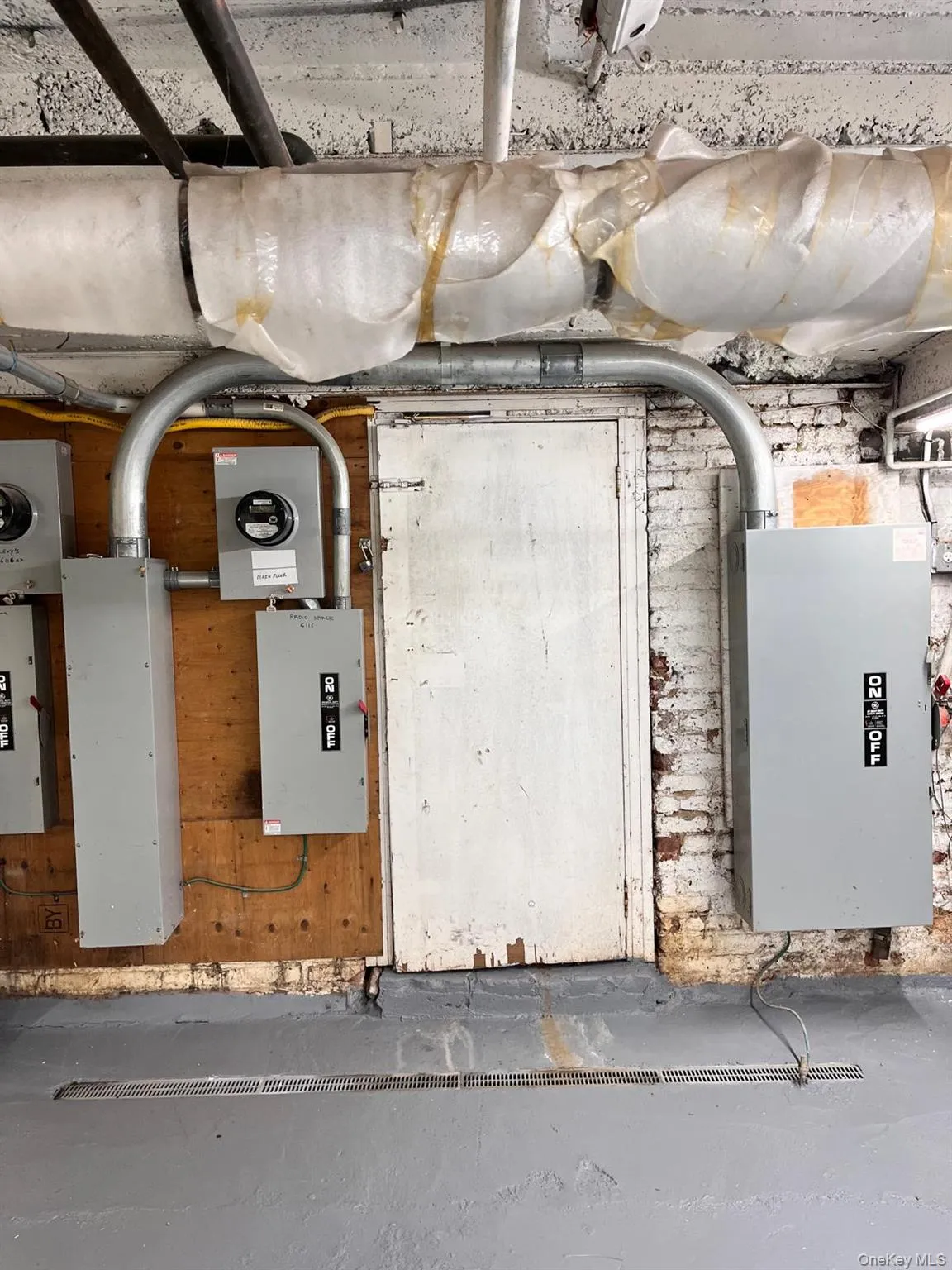 Utility room featuring electric panel Utility room featuring electric panel