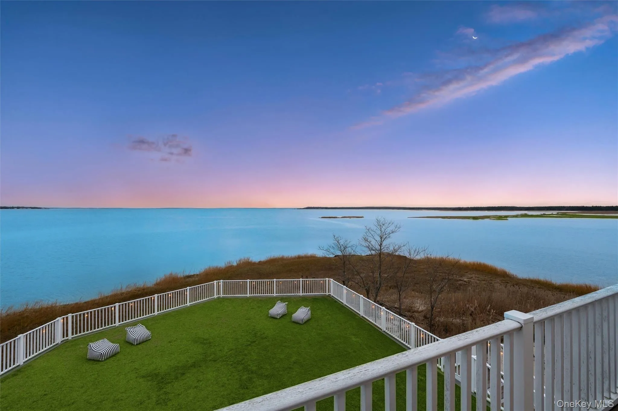 Water view with a fenced backyard Water view with a fenced backyard