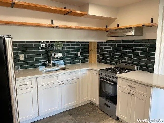 This stylish kitchen is ready for you to prepare and enjoy meals. This stylish kitchen is ready for you to prepare and enjoy meals.