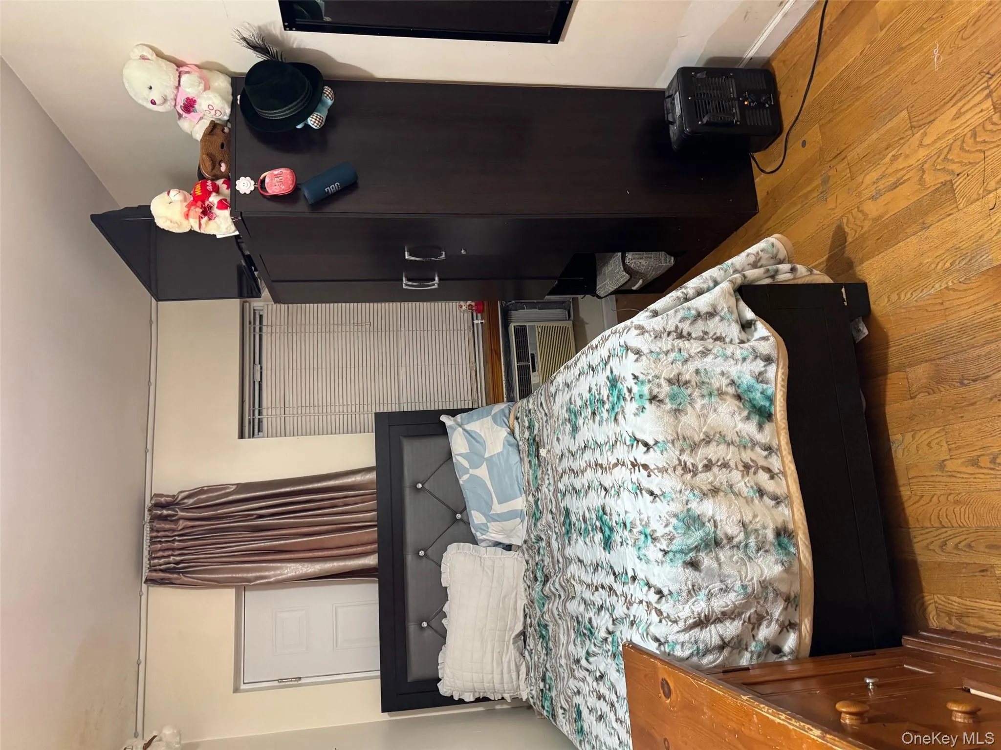 Bedroom featuring light wood-style floors Bedroom featuring light wood-style floors