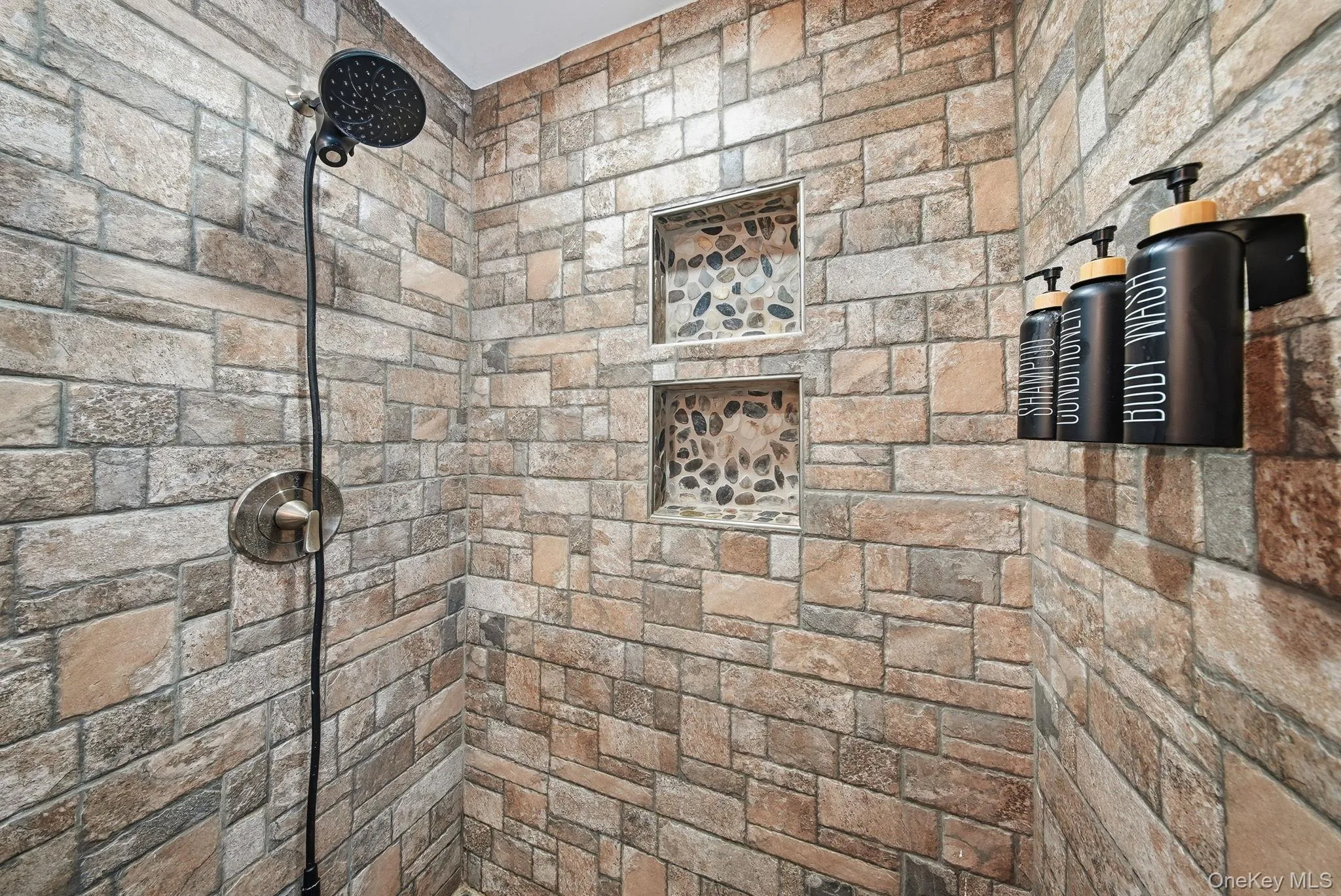 Bathroom with tiled shower Bathroom with tiled shower