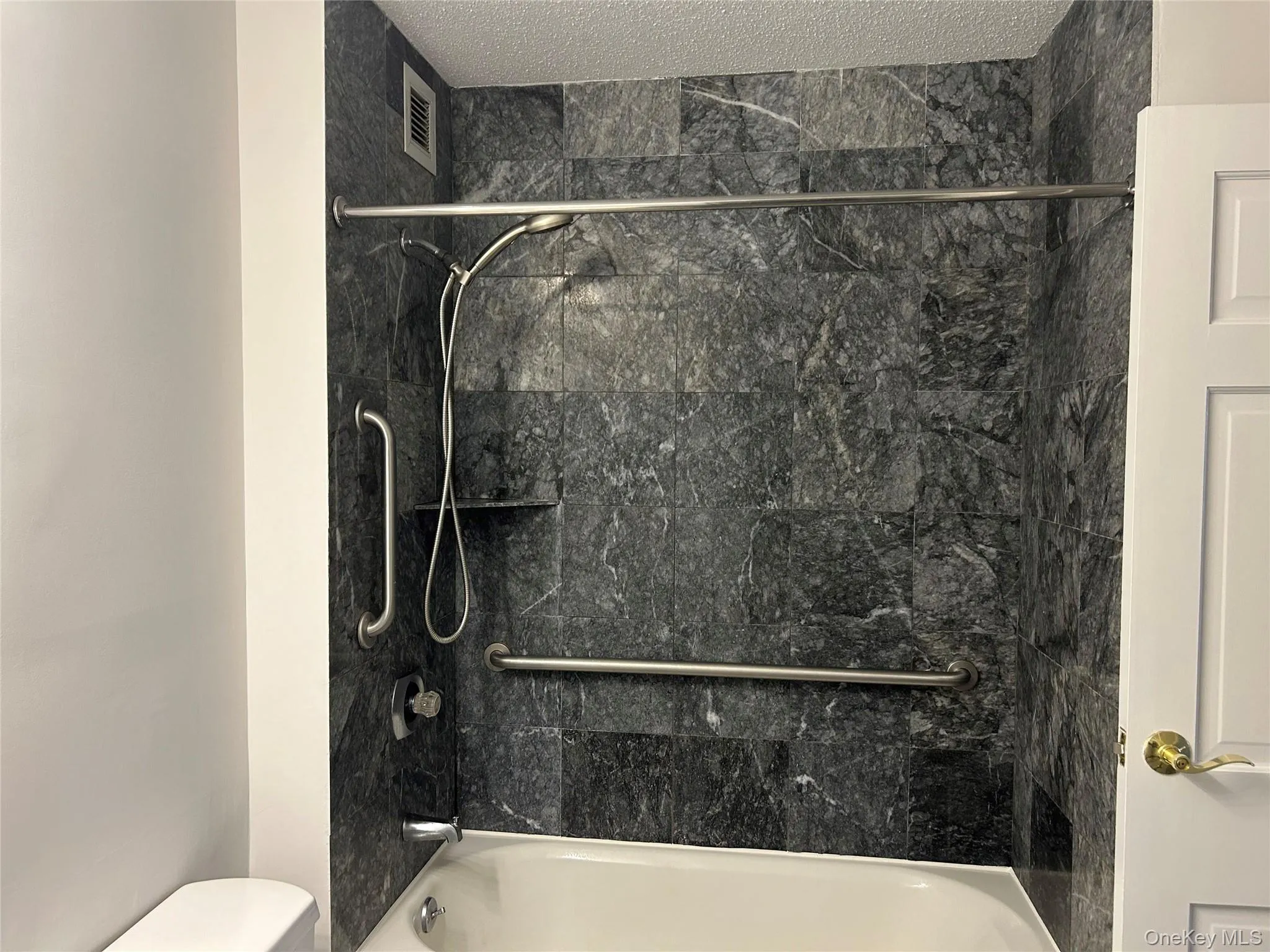 Bathroom with shower / washtub combination Bathroom with shower / washtub combination