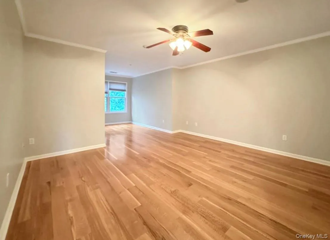 The large primary bedroom is flooded with natural light, creating an airy feel The large primary bedroom is flooded with natural light, creating an airy feel