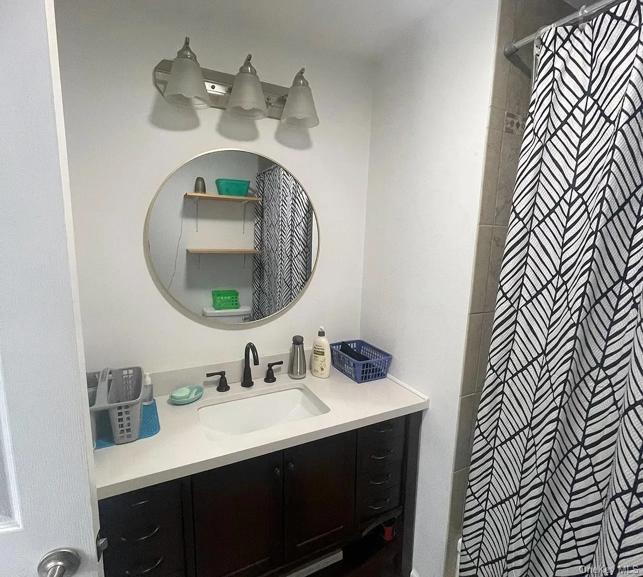 Bathroom with vanity and a shower Bathroom with vanity and a shower